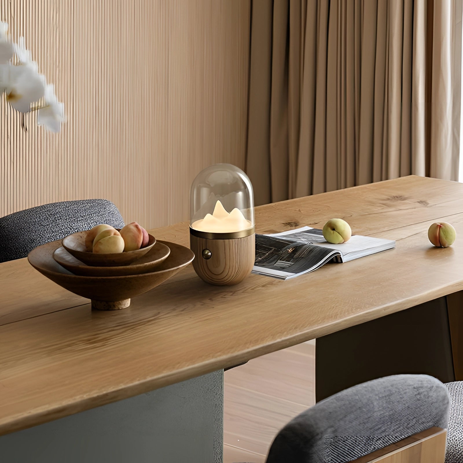 LED flame lamp with a natural wood base positioned on a table in a home setting, showcasing its modern design and warm, ambient lighting feature.