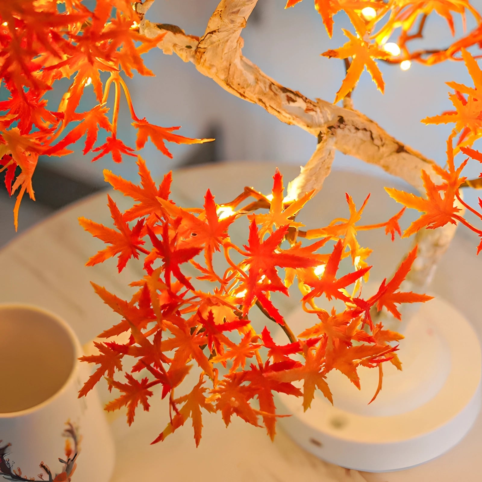 LED Maple Bonsai Tree Lamp featuring realistic amber and orange maple leaves on delicate branches, USB powered for autumn-themed lighting and decor.