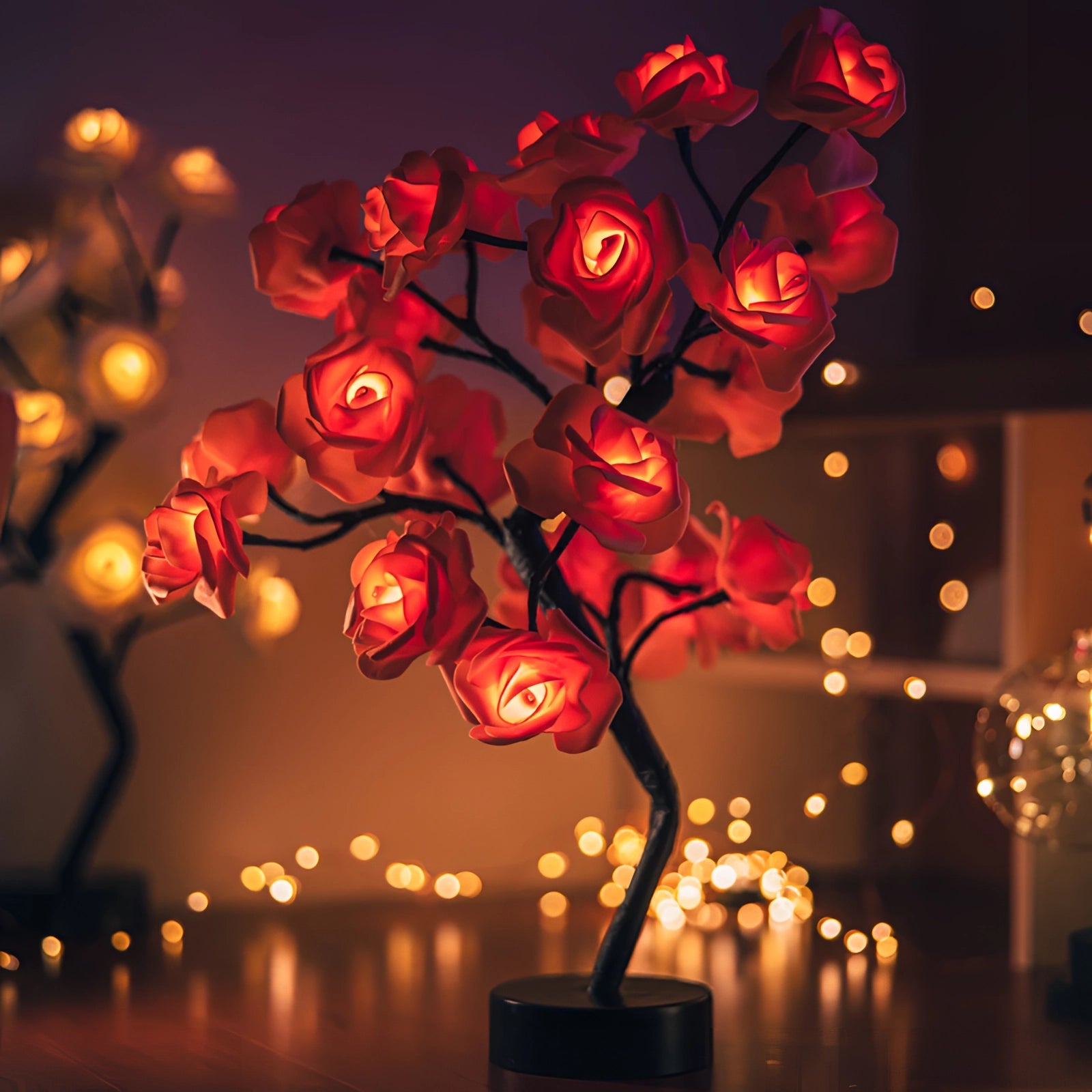 A romantic red LED rose lamp glowing in the dark, designed to look like a vibrant flower with a warm amber light, perfect as a Valentine's gift or decorative piece.