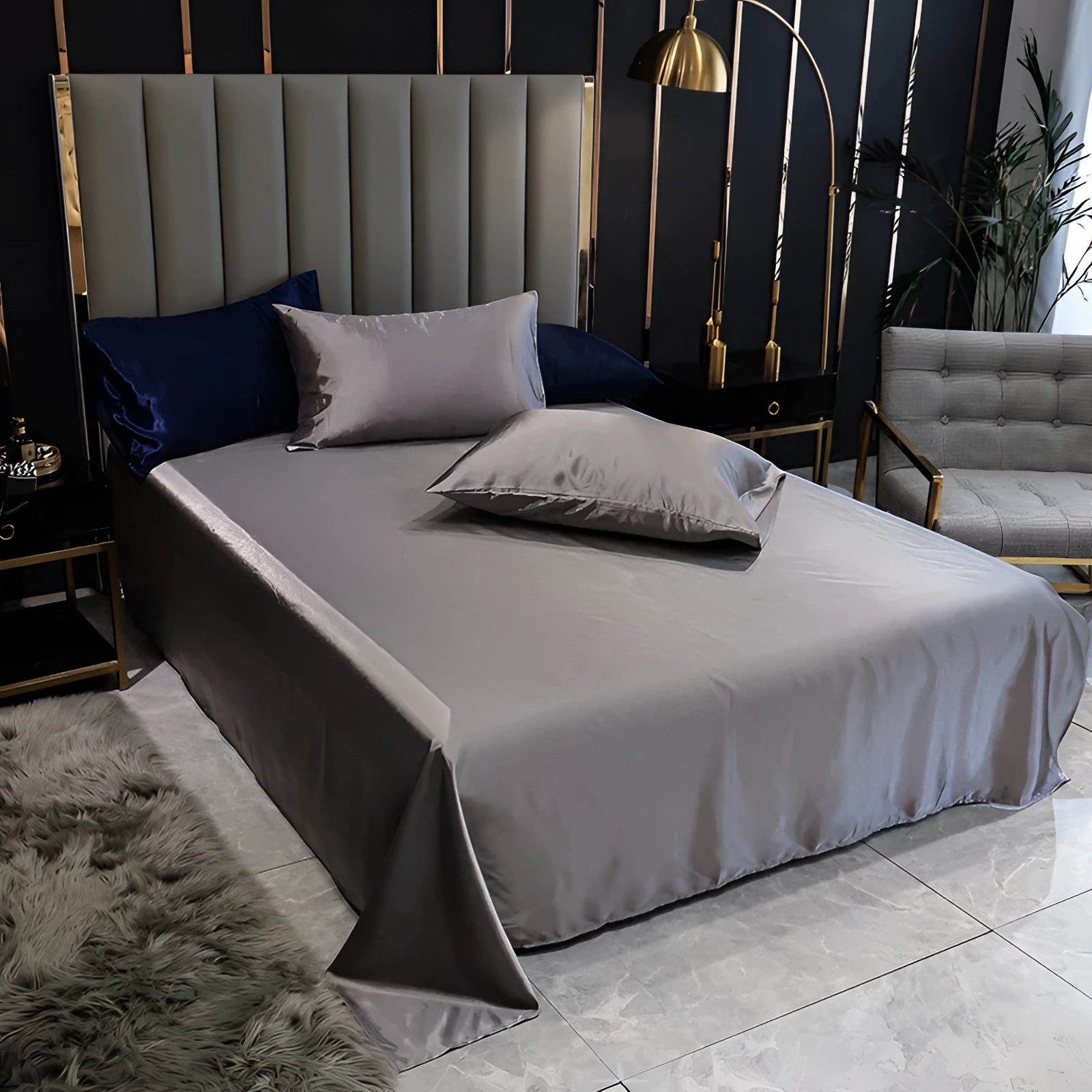 Luxury black silk bedding set with elegant satin bed sheets and duvet cover in gray, fitting a bed size of 245x270cm, featuring a comfortable and stylish interior design with matching pillows and a wooden bed frame.
