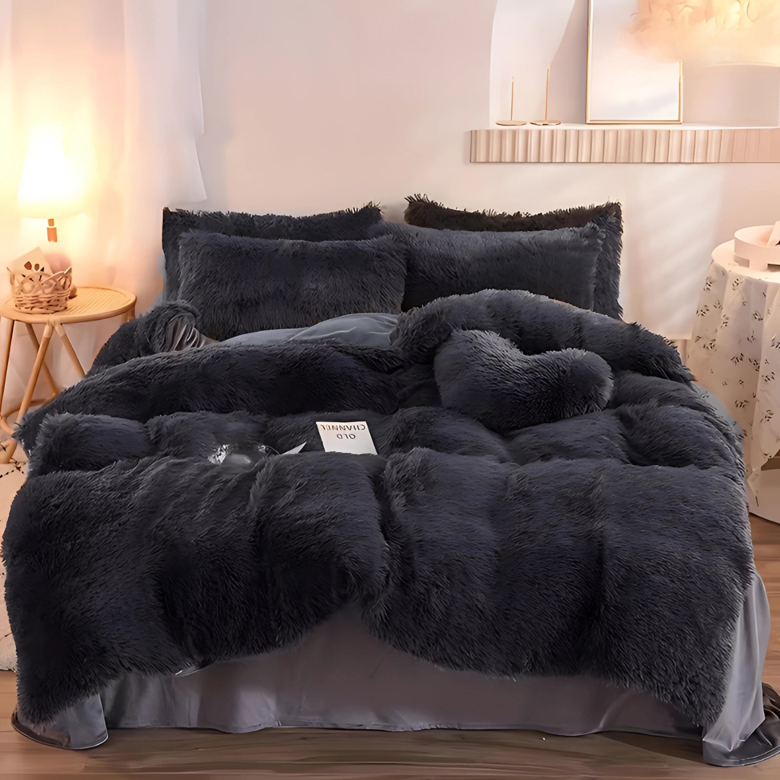 Luxurious blue faux fur comforter in a superking size, draped over a bed in a cozy interior setting with warm lighting and wooden flooring.