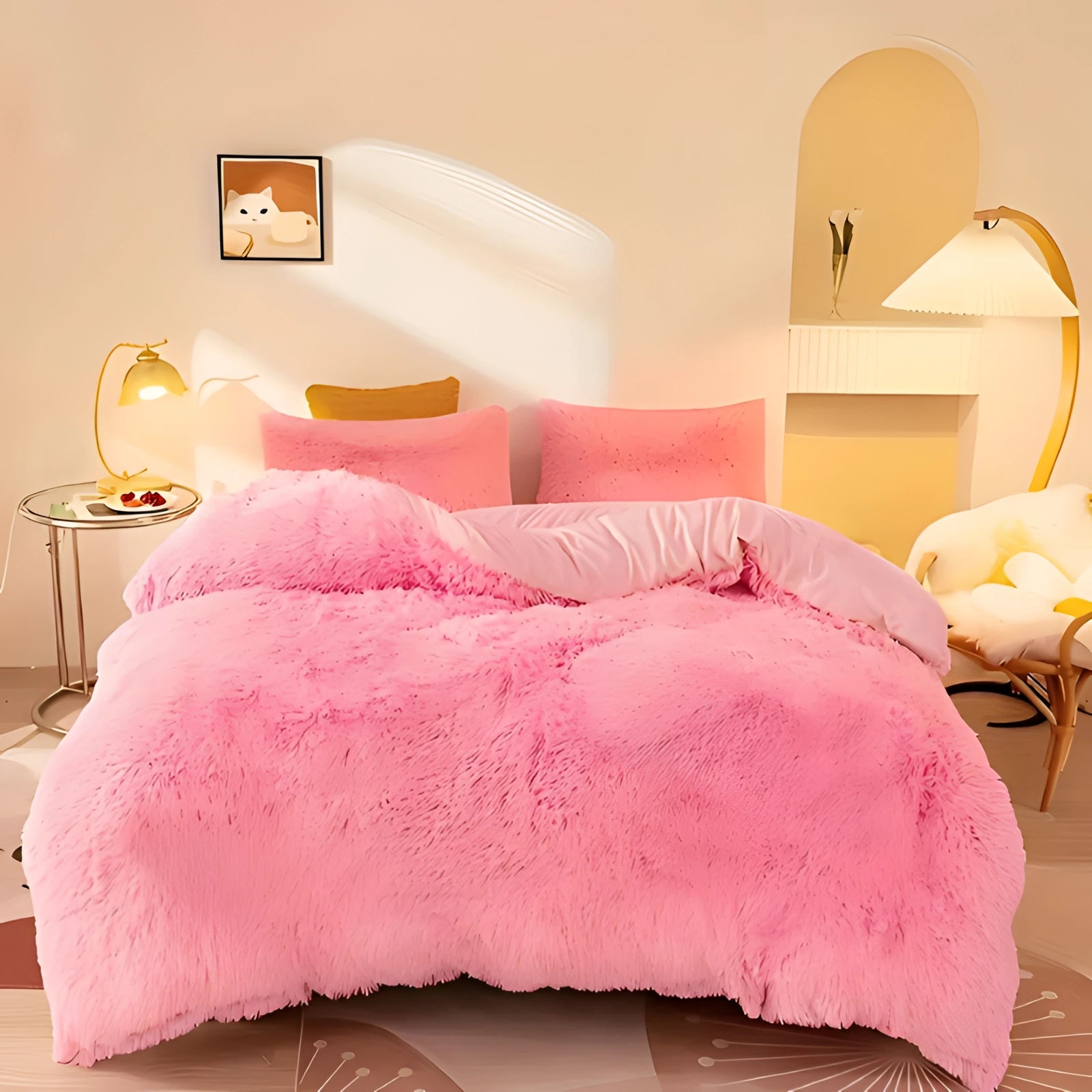 Luxury pink faux fur comforter on a super king-sized bed with matching pillows, situated in a stylish bedroom featuring a wooden bed frame, a floor lamp, and elegant interior design elements.