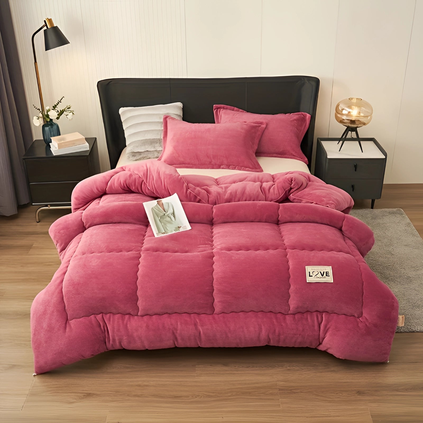 Luxurious dark pink velvet comforter set displayed on a wooden bed, featuring a plush quilt and matching pillows, complemented by soft lighting and a cozy ambiance.