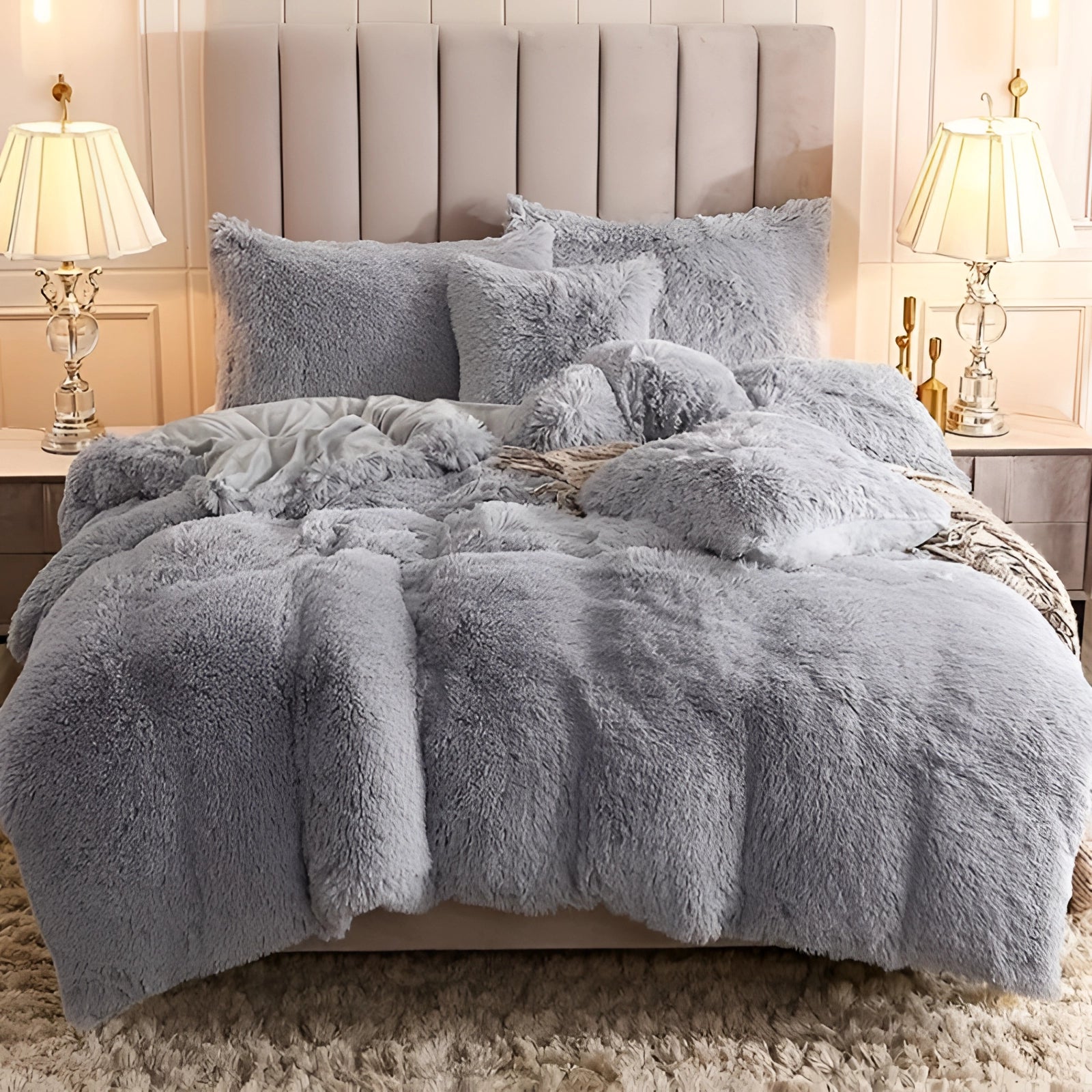Superking-sized luxury dark grey faux fur bedding set featuring a soft plush comforter and shams, styled in an elegant bedroom interior with cozy lighting and wooden furniture elements.