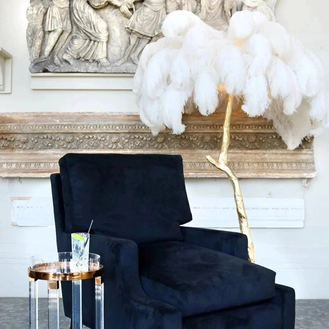 Luxury Feather Floor Lamp with Gold Palm Tree Art Deco Design in a stylish interior setting, featuring a mix of white, black, and wood elements.