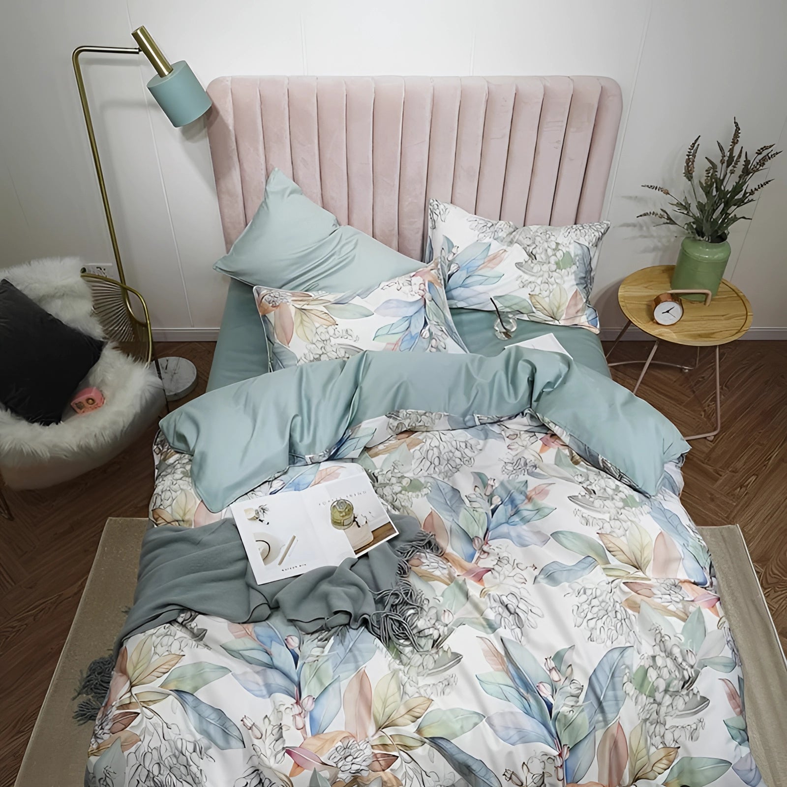 Luxurious floral bedding set in pastel green, featuring a cotton duvet and pillow set designed for an American King-size bed, adorned with delicate floral patterns against a serene backdrop, complemented by a cozy and inviting ambiance.