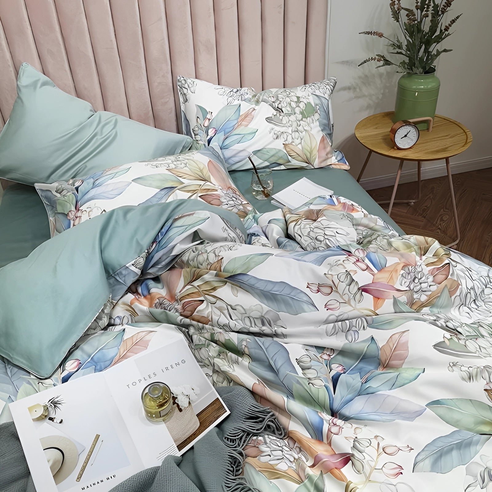 Luxury floral bedding set in pastel green featuring a cotton duvet and matching pillow set with a floral pattern, displayed in a comfortable room setting.