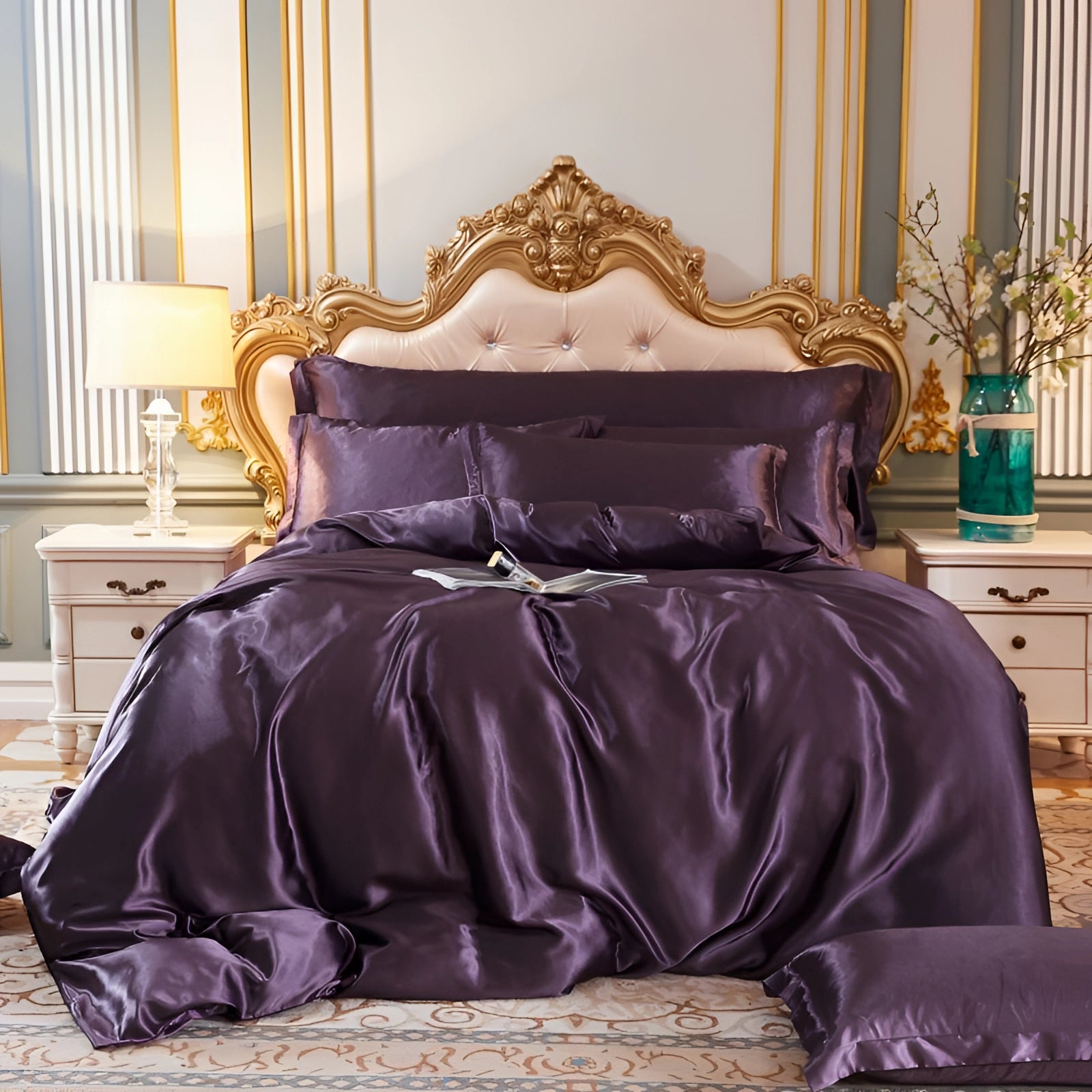 Luxury silk bedding set in a rich rum color, displayed on a 180x200cm fitted bed in a cozy bedroom setting. The bed features a wooden frame, surrounded by matching furniture and cabinetry, with a focus on comfort and elegance. The bedding set consists of four pieces, enhancing the luxurious and thermal-regulating qualities of the silk material.