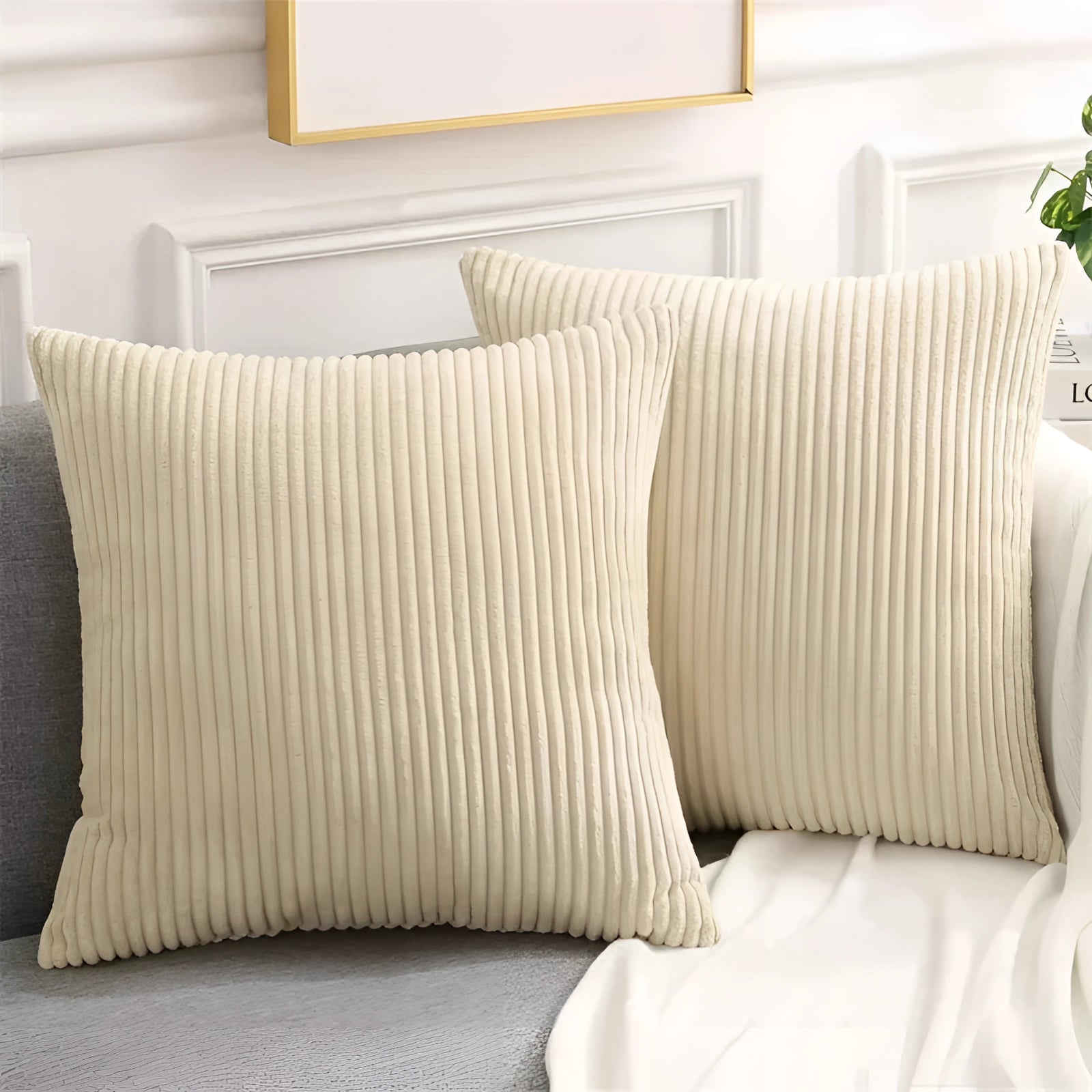 Luxury soft corduroy cushion cover in beige, measuring 50x50cm, displayed on a stylish couch, showcasing high-quality upholstery fabric in a comfortable, interior design setting.