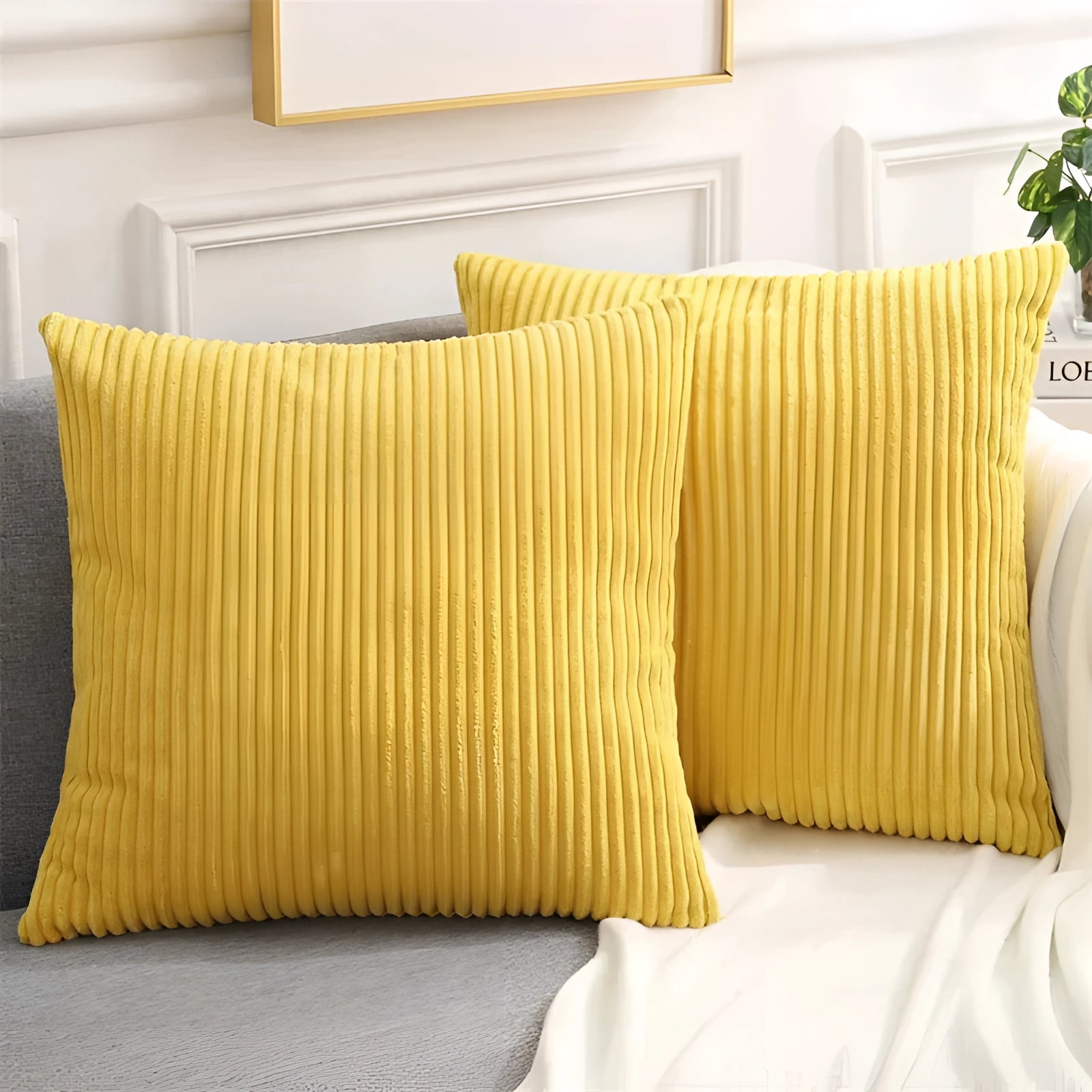 Luxury soft corduroy cushion cover in yellow, measuring 50x50cm, displayed on a wooden chair, showcasing its high-quality upholstery fabric and rectangular shape.