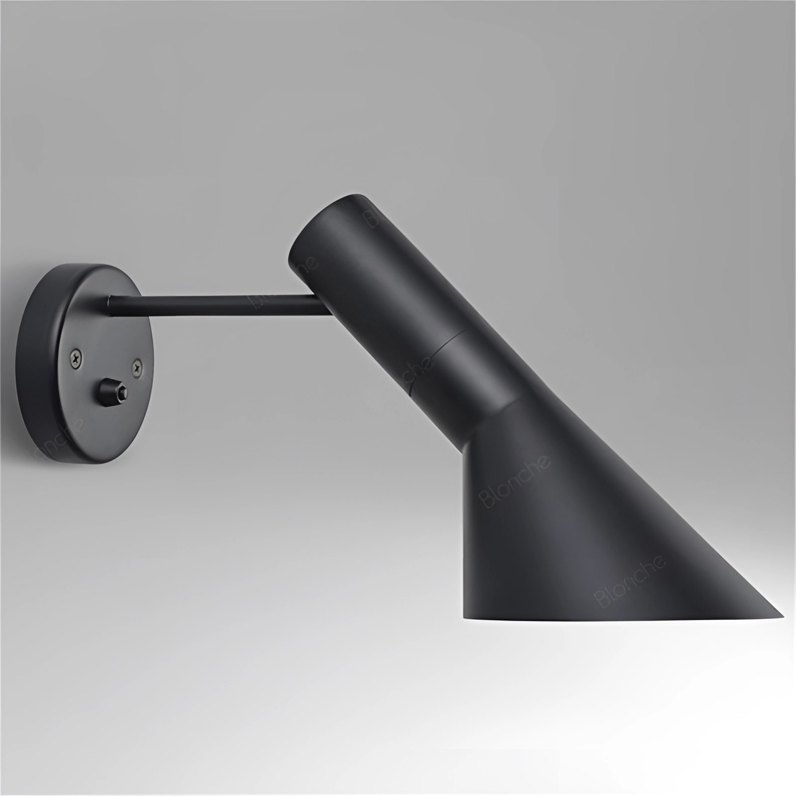 Matte black adjustable LED wall lamp with a modern design, featuring a sleek cylindrical shape made of metal, perfect for illuminating bedrooms.