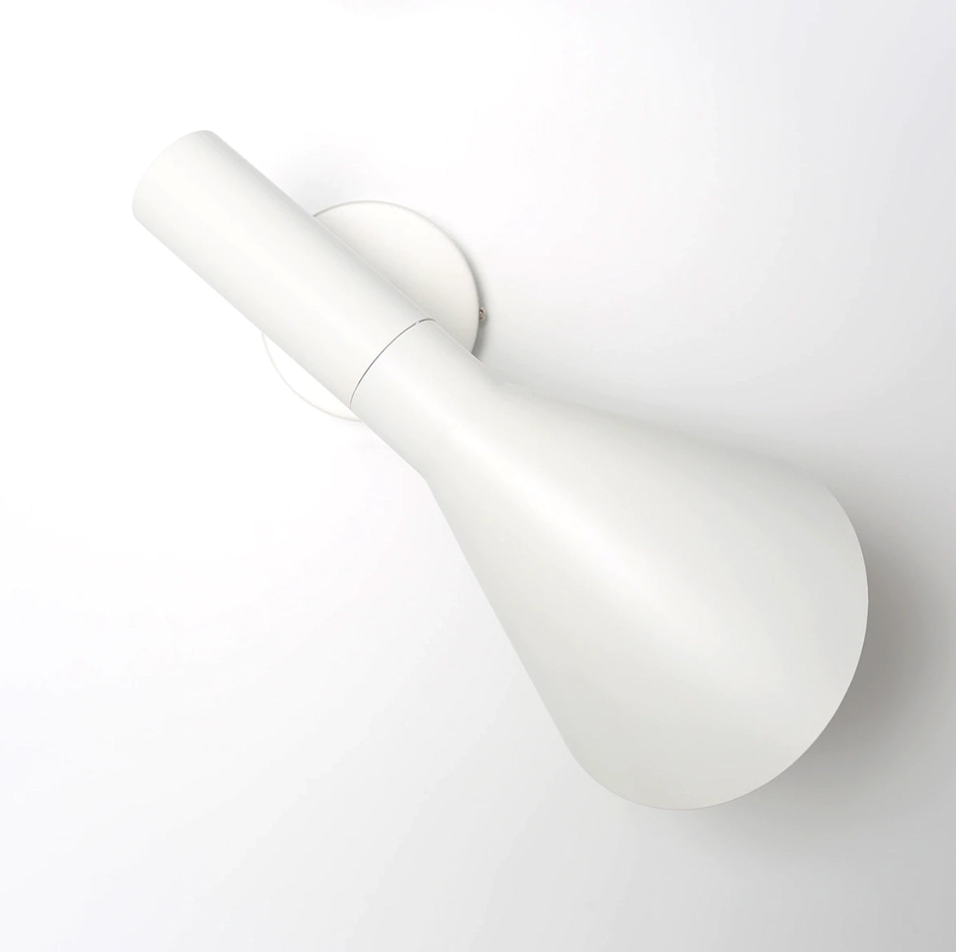 Matte black adjustable LED wall lamp with a modern design, featuring a sleek metal frame and a flexible arm for directing light, ideal for bedroom settings.