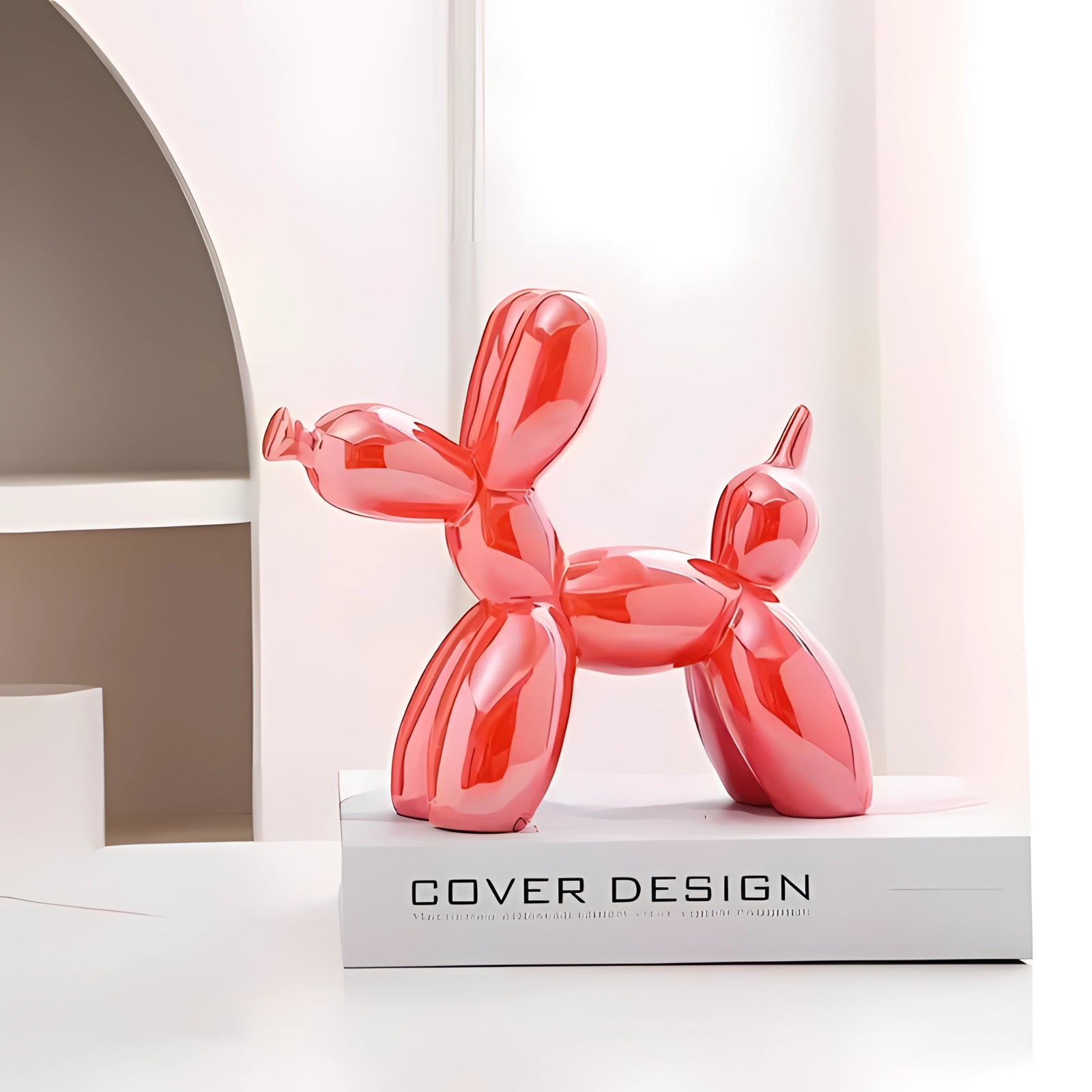 Orange metallic balloon dog sculpture, modern art decor piece, luxury accent, reflecting light with a smooth and shiny surface, resembling a playful balloon animal typically seen at parties or events.