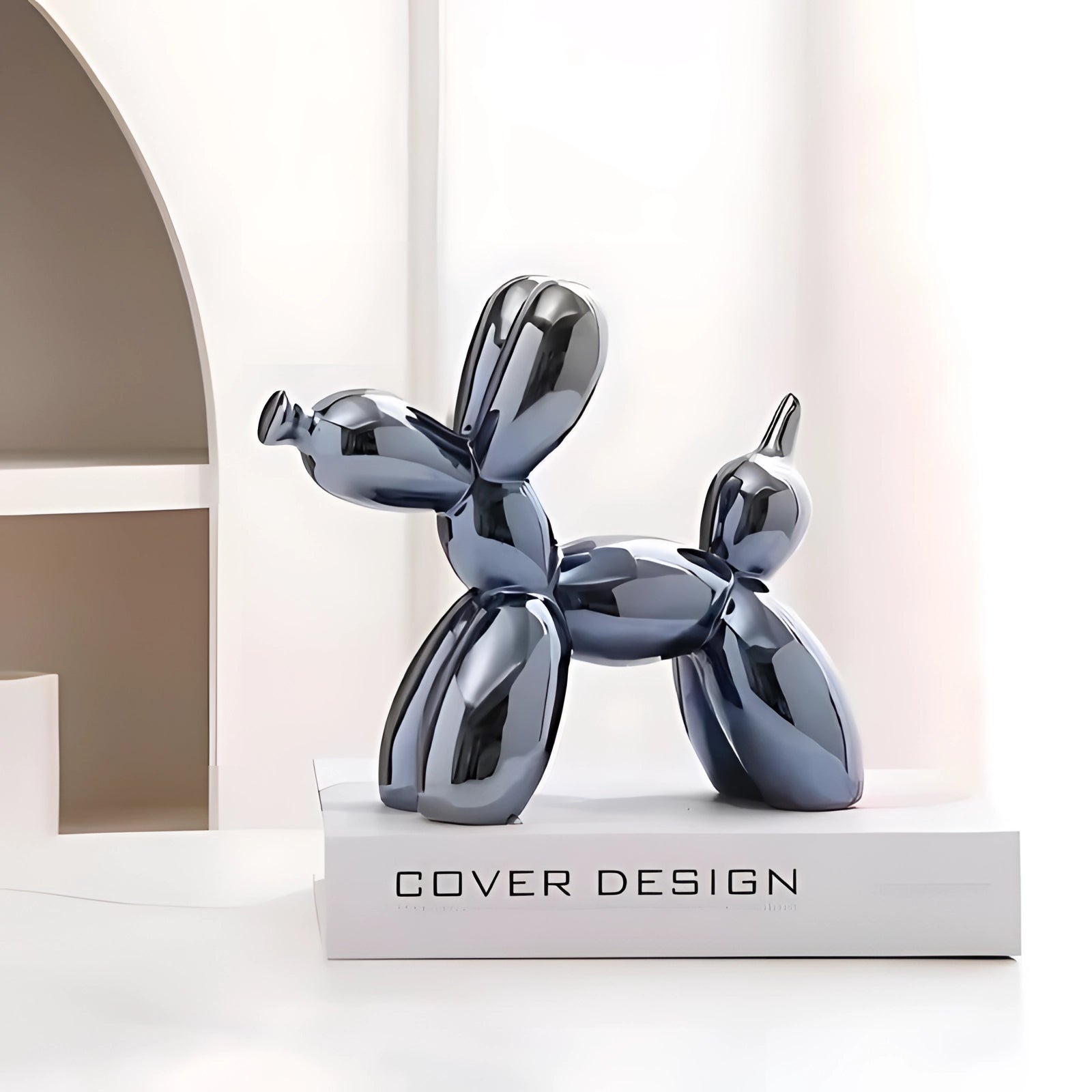 Metallic balloon dog sculpture in a vibrant blue color, displayed as a modern art decor piece.
