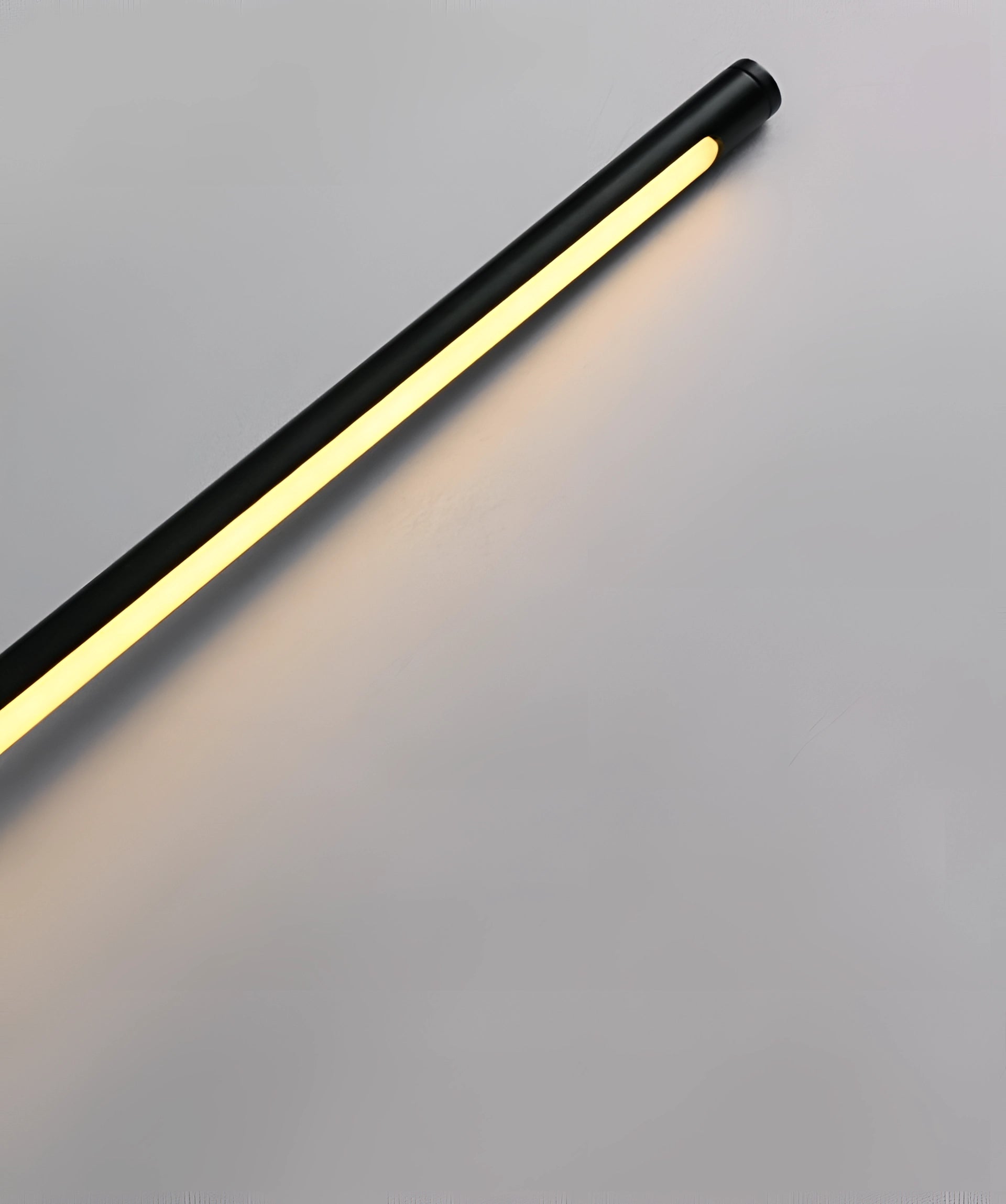 Minimalist LED wall sconce with sleek vertical design, made of metal, ideal for modern home interiors.