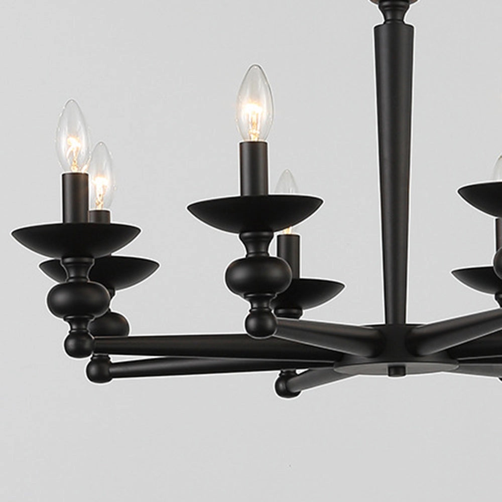 Modern black six-light candle chandelier with elegant metal design, featuring candle holders hanging from a ceiling fixture. Perfect for adding a sophisticated touch to dining areas.