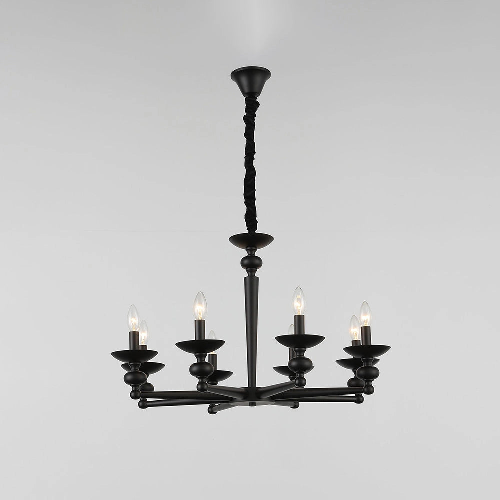 Modern black six-light candle chandelier with an elegant design, featuring metal construction and symmetrical arrangement, suspended from the ceiling, ideal for dining room interior lighting.