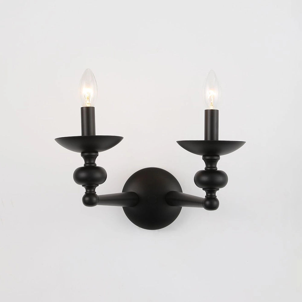 Elegant modern black six-light candle chandelier with circular design, featuring metal and glass elements, suitable for dining room ceiling lighting.