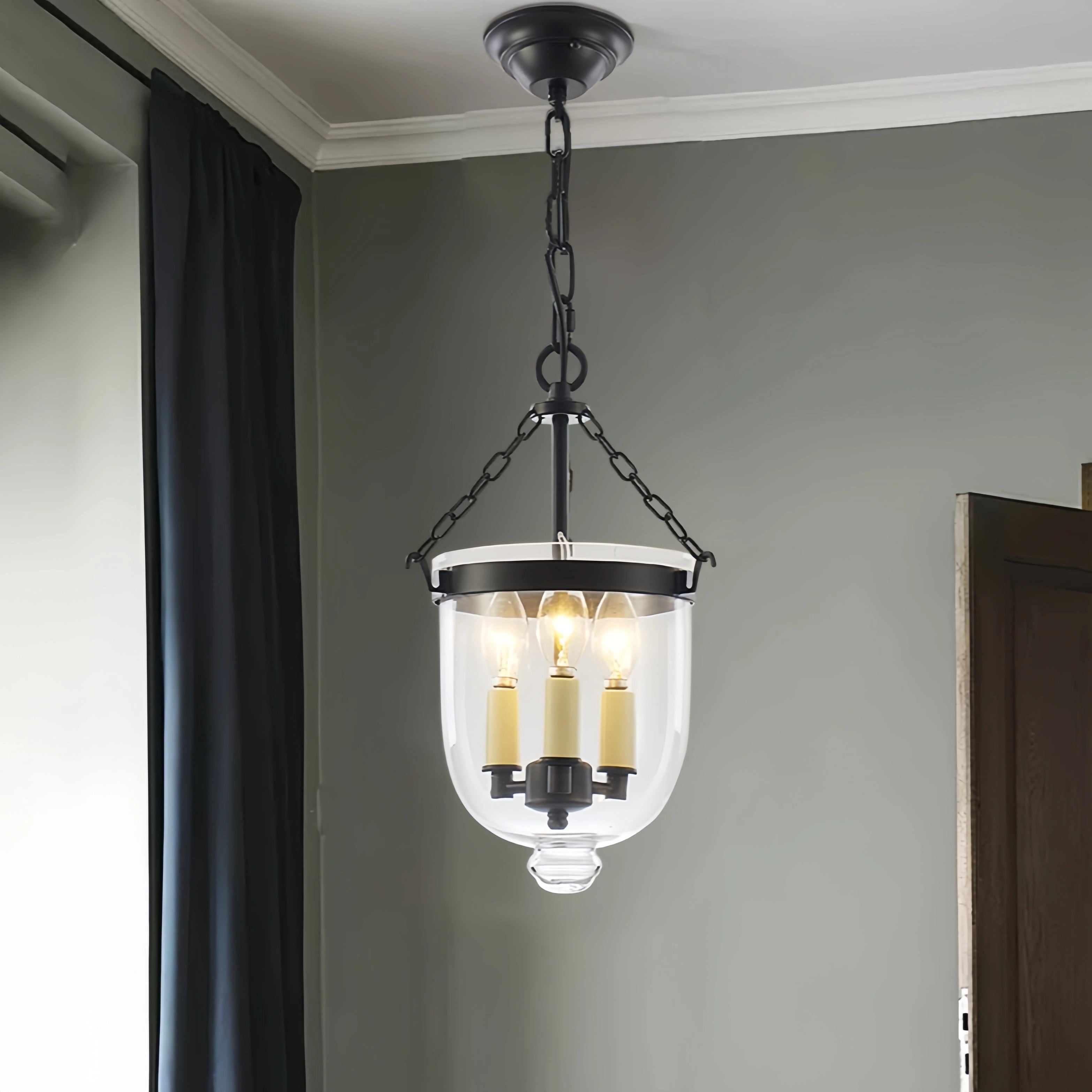 Modern indoor pendant light with a luxurious brass and glass chandelier design, featuring a black finish and a diameter of 13.8 inches. The fixture is elegantly styled for interior design with a rectangular shade, adding sophistication to any room.