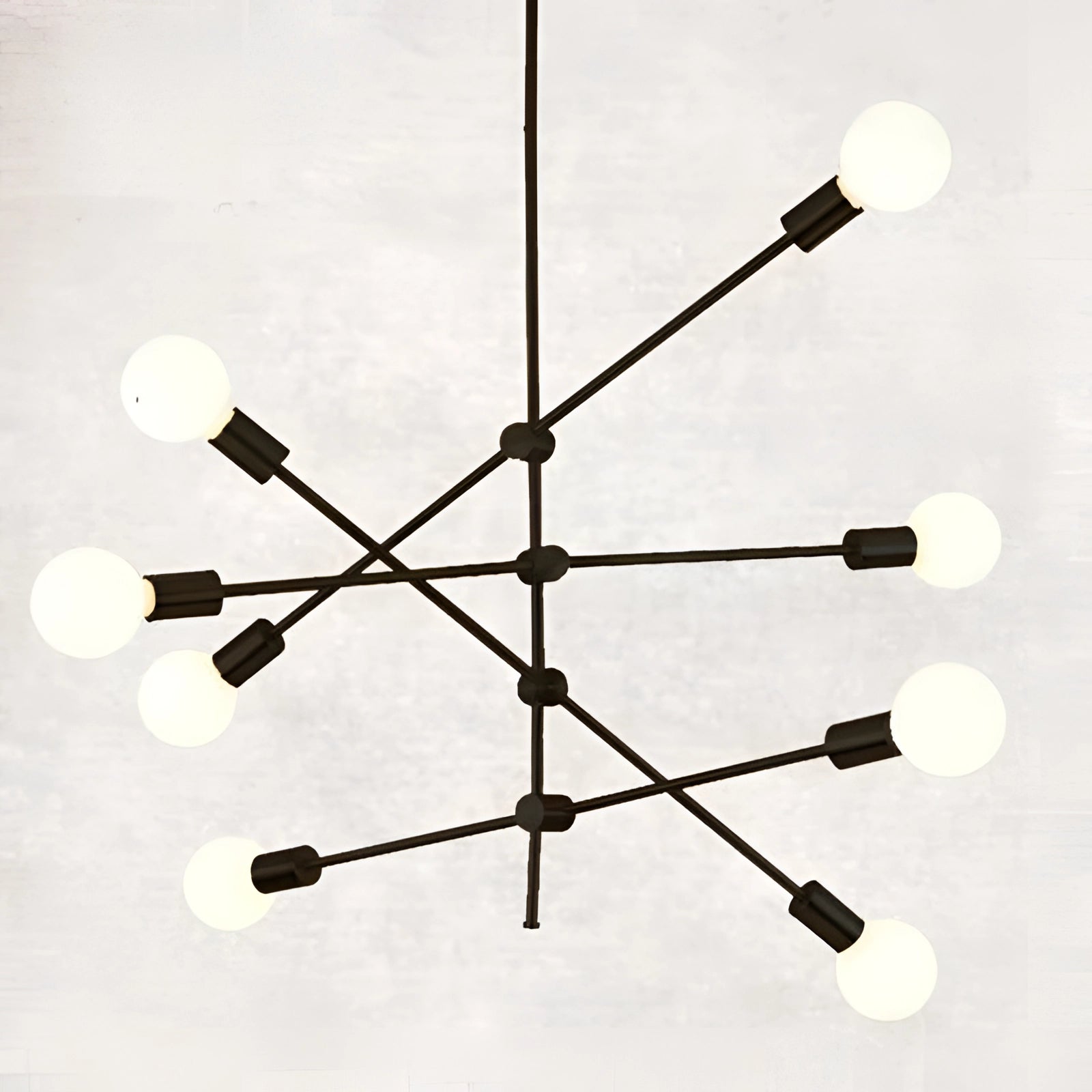 Modern brass Sputnik chandelier with 8 bulbs, mid-century adjustable geometric light fixture in black, featuring symmetrical metal design hanging from the ceiling.
