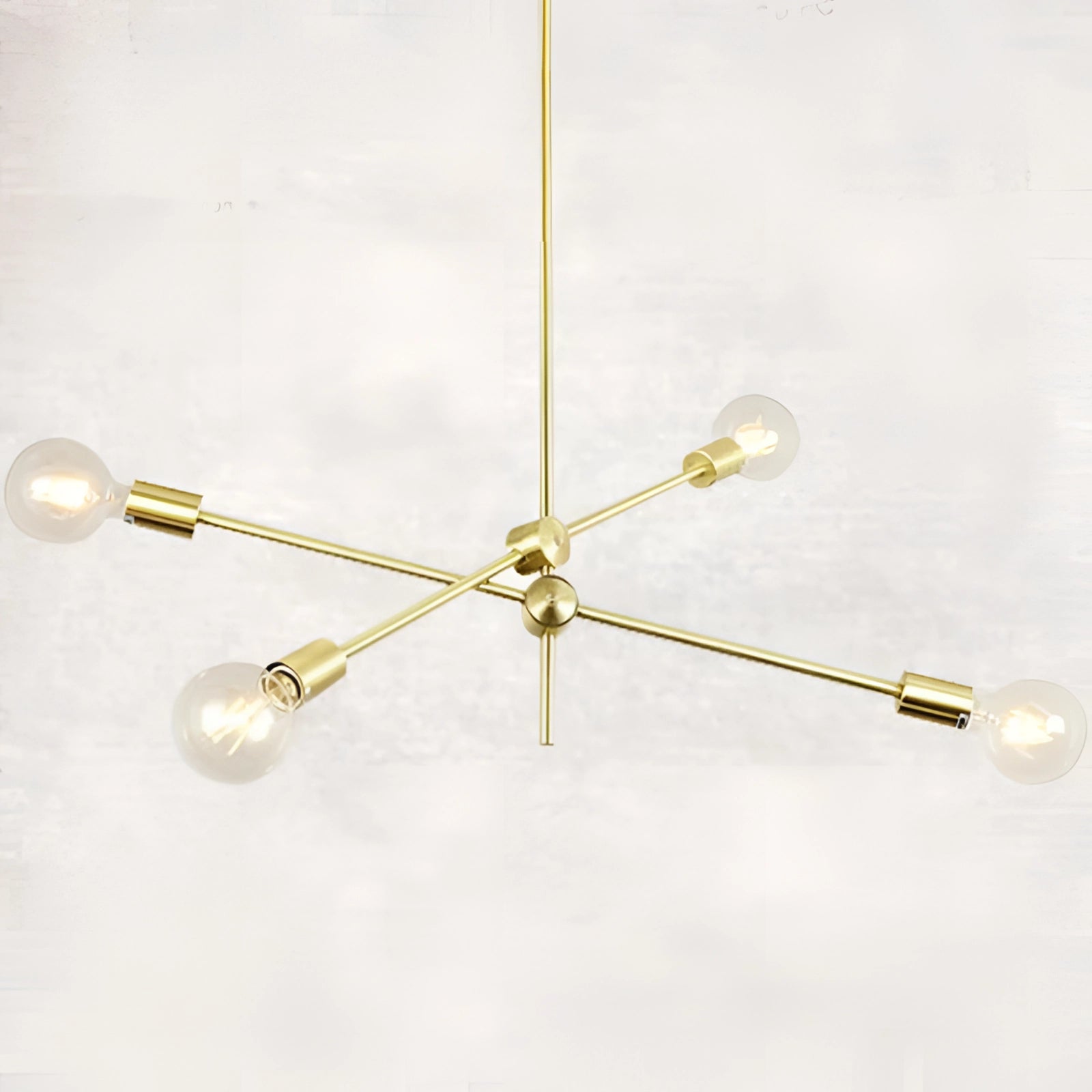 Modern brass Sputnik chandelier with a mid-century design featuring an adjustable geometric pattern, equipped with 4 gold bulbs.