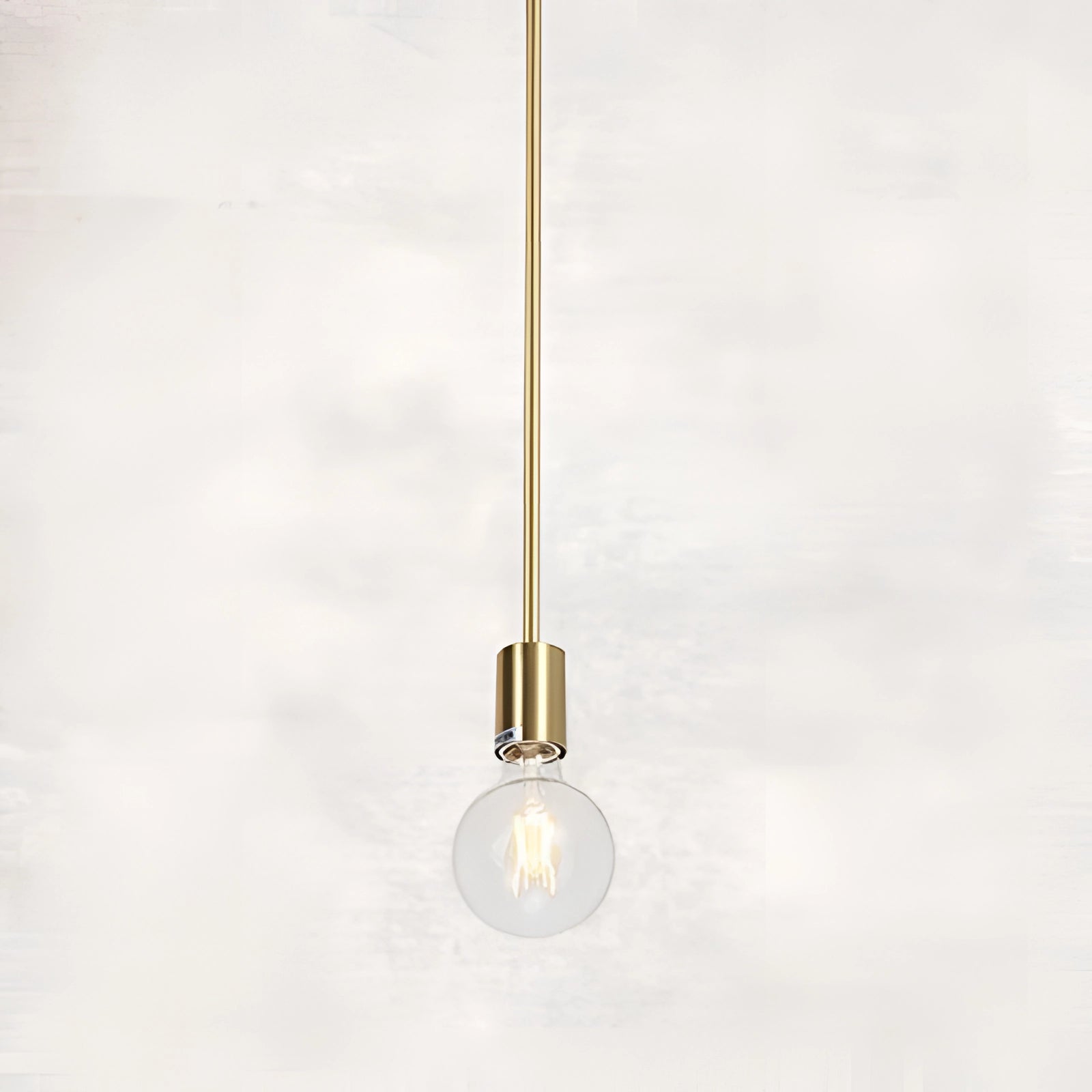 Modern brass Sputnik chandelier with a mid-century adjustable geometric design, featuring a single bulb in a gold finish.
