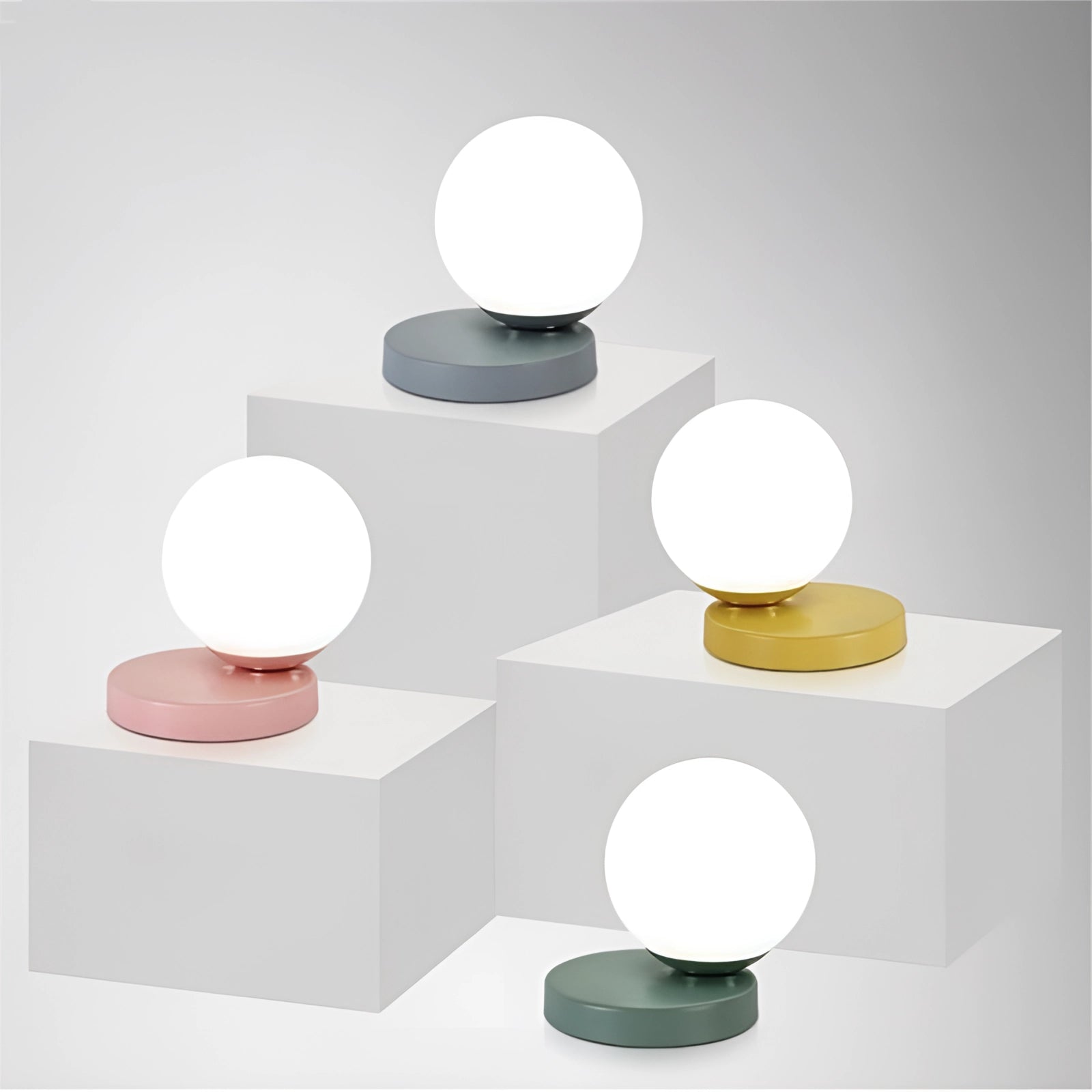 Modern designer orb lamp featuring a spherical LED globe resting on a sleek metallic base, displayed in a contemporary setting with artistic design elements.