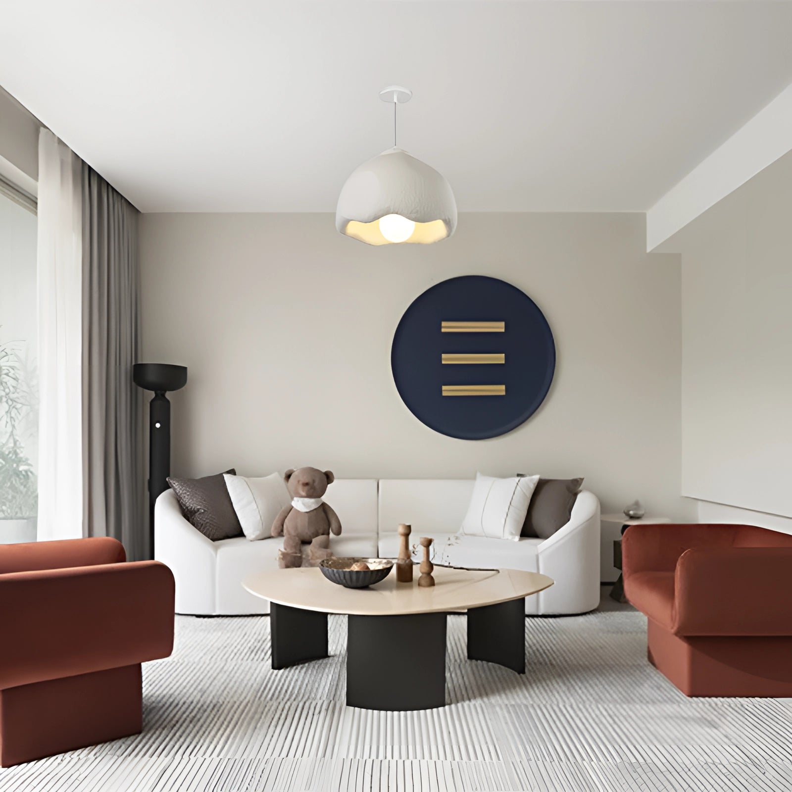 Modern dome pendant light in textured white with a scalloped design, hanging in a stylish living room setting featuring a couch, table, and wood flooring.