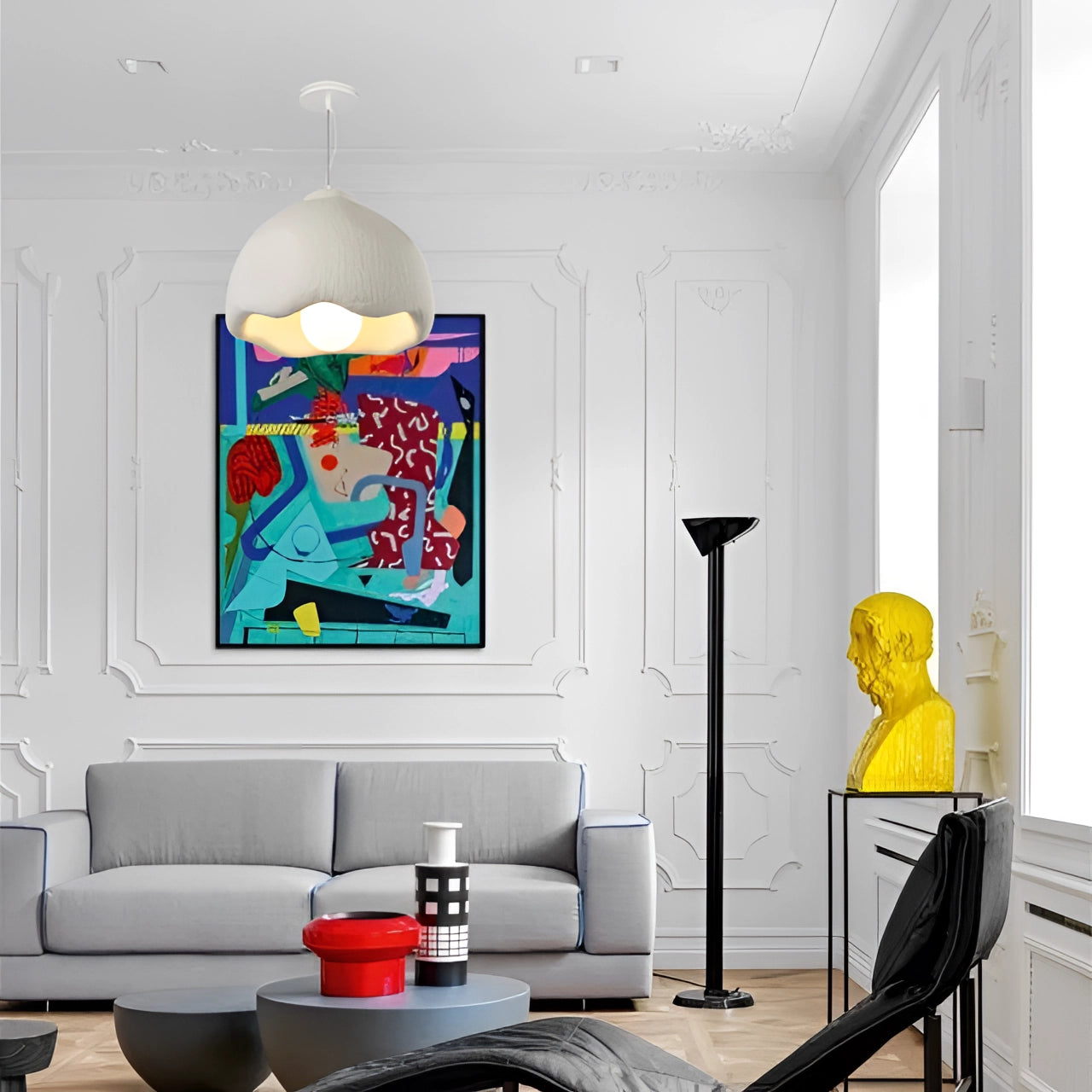 Modern dome-shaped pendant light with a textured white finish and scalloped design, hanging in a stylish living room setting, providing ambient lighting and enhancing the interior decor.