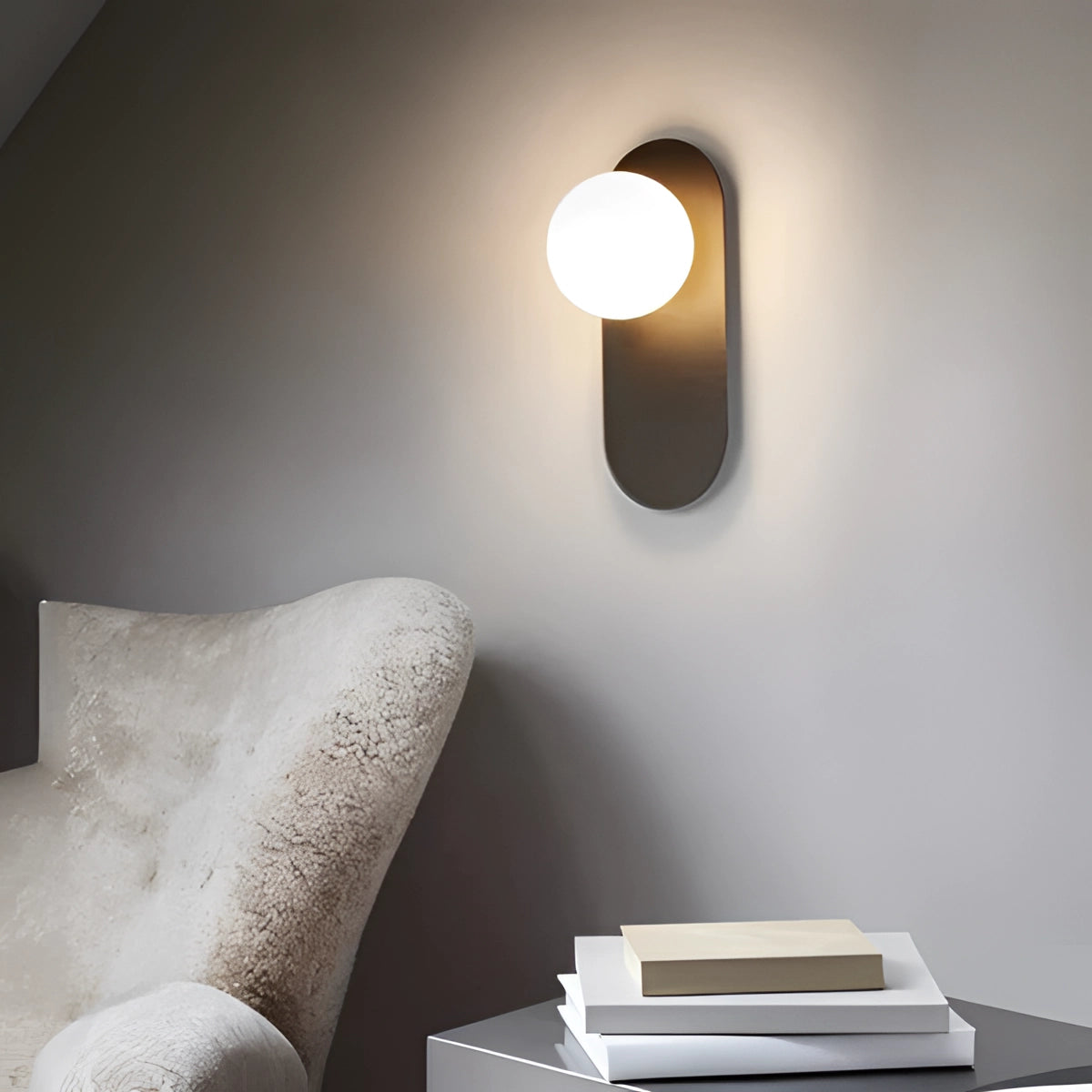 Modern dual globe brass wall sconces in gold and white, featuring a minimalistic design, mounted on a wooden wall, emitting cool white light, enhancing the comfort and elegance of the interior decor.