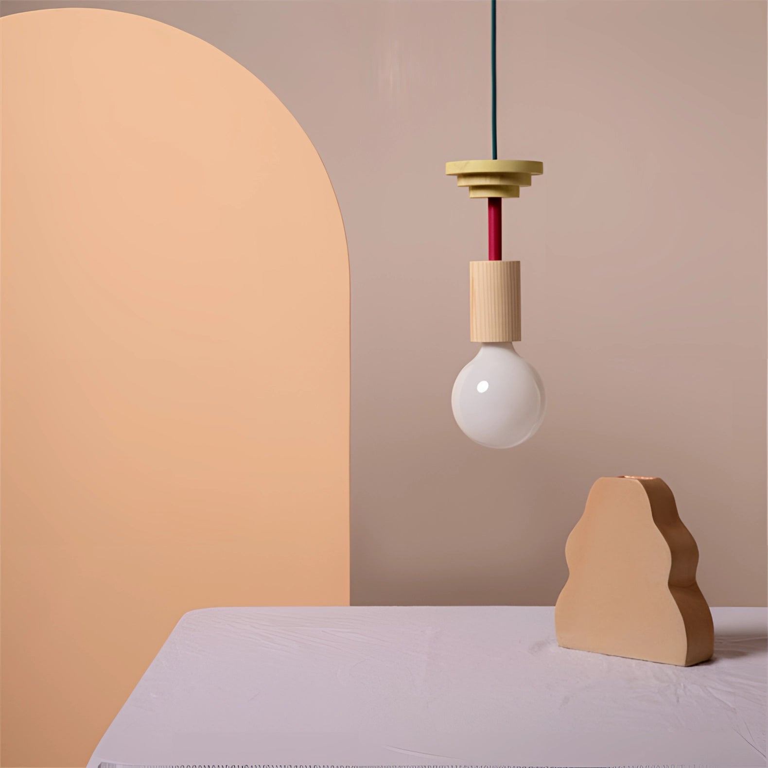 Modern Geometric LED Pendant Light featuring colorful wood blocks in various shapes and shades, hanging as a unique and artistic lighting accessory.