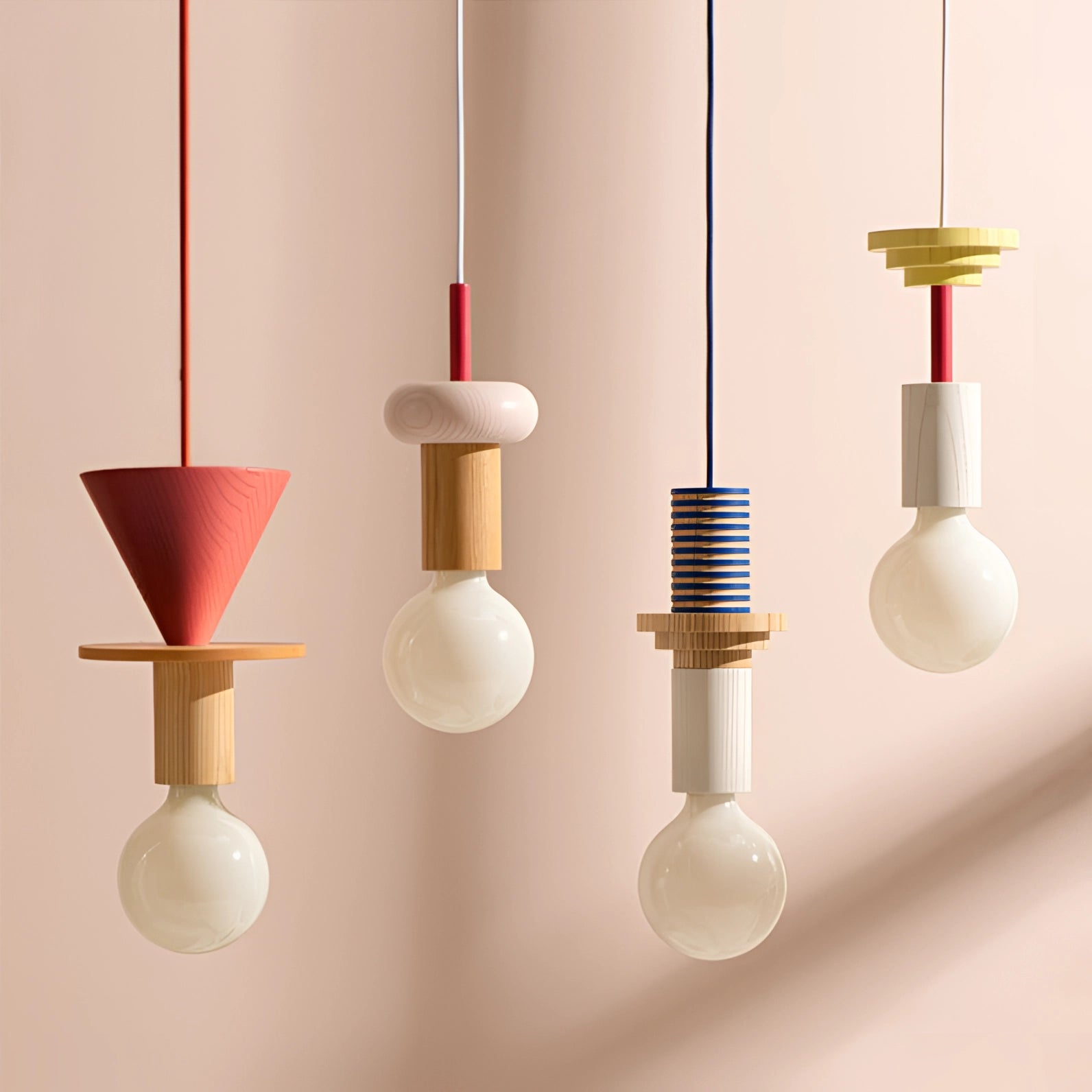 Modern geometric LED pendant light featuring colorful wood blocks, hanging from the ceiling, illuminating a stylish interior design.