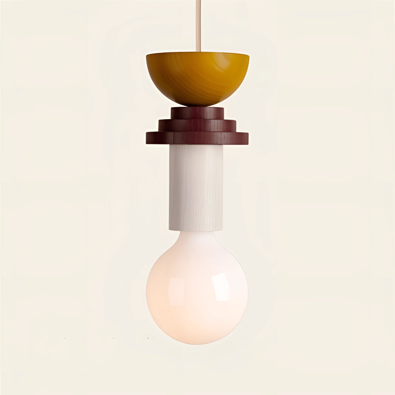 Modern geometric LED pendant light with colorful wood blocks in taupe, featuring a circular lampshade, hanging from the ceiling.