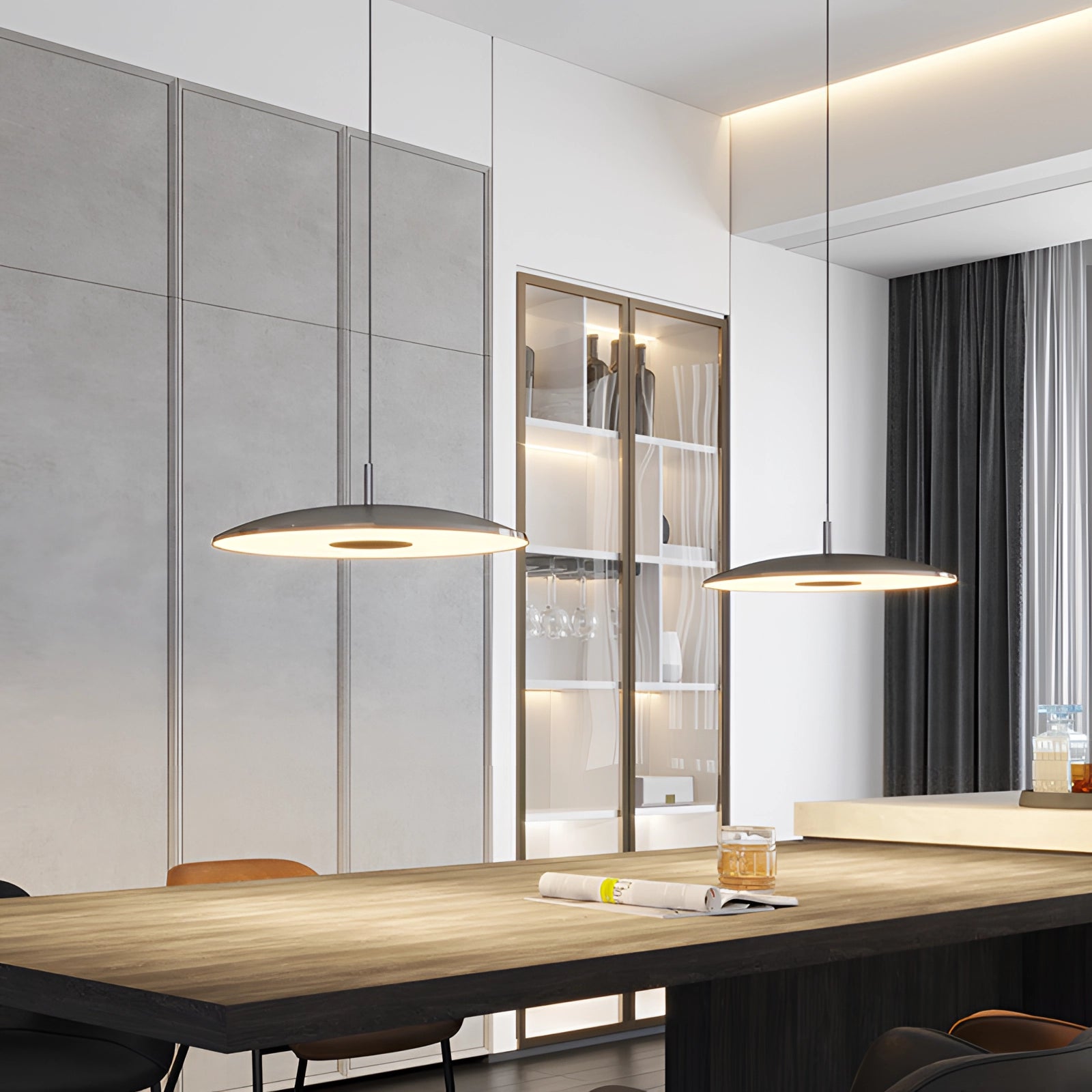 Modern gold-brushed pendant light with a nickel finish, 19.7 inches in diameter, hanging over a sleek dining table in a stylish interior setting.