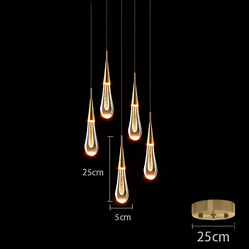 Modern LED gold teardrop pendant lights with a B-Style 5-head design, emitting cold white light, elegantly illuminating a dark setting, suitable for kitchens and dining rooms.