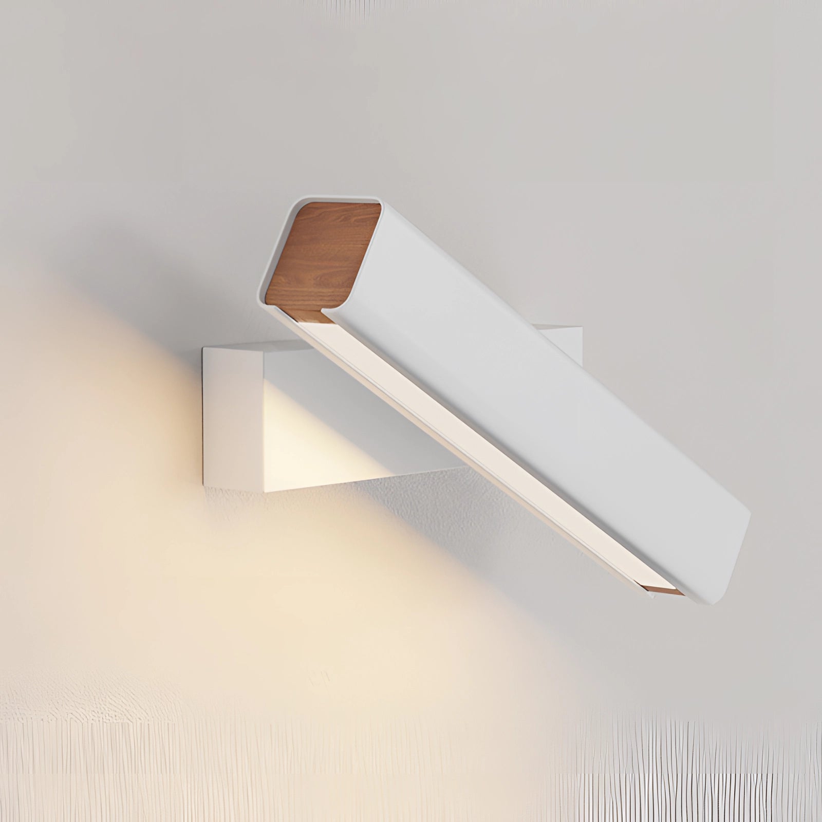 Modern LED wall sconce in black and gold with an adjustable contemporary design, mounted on a wooden wall panel, featuring sleek metal construction and rectangular shape.