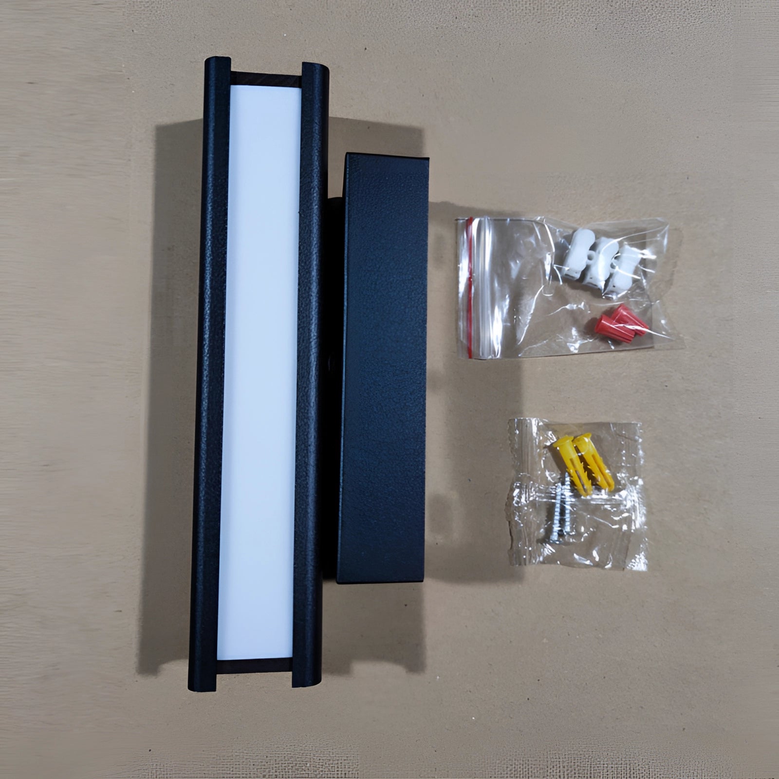 Modern LED wall sconce in black and gold with a contemporary design featuring an adjustable rectangular shape made of aluminum and composite materials, emitting electric blue light.