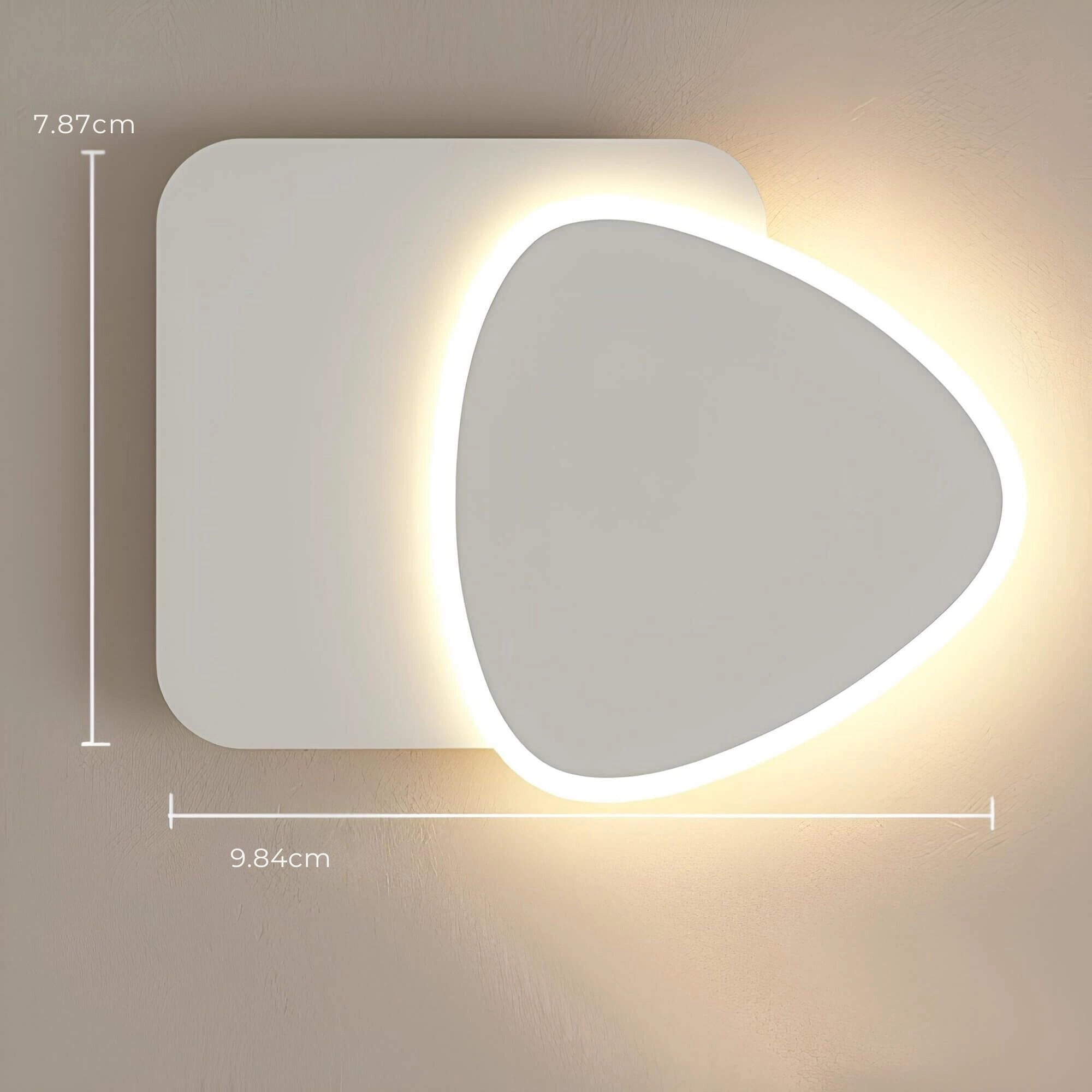 Modern LED wall sconce featuring a geometric minimalist design, showcasing a rectangular shape with a circular element, providing ambient indoor lighting suitable for contemporary art-inspired interiors.