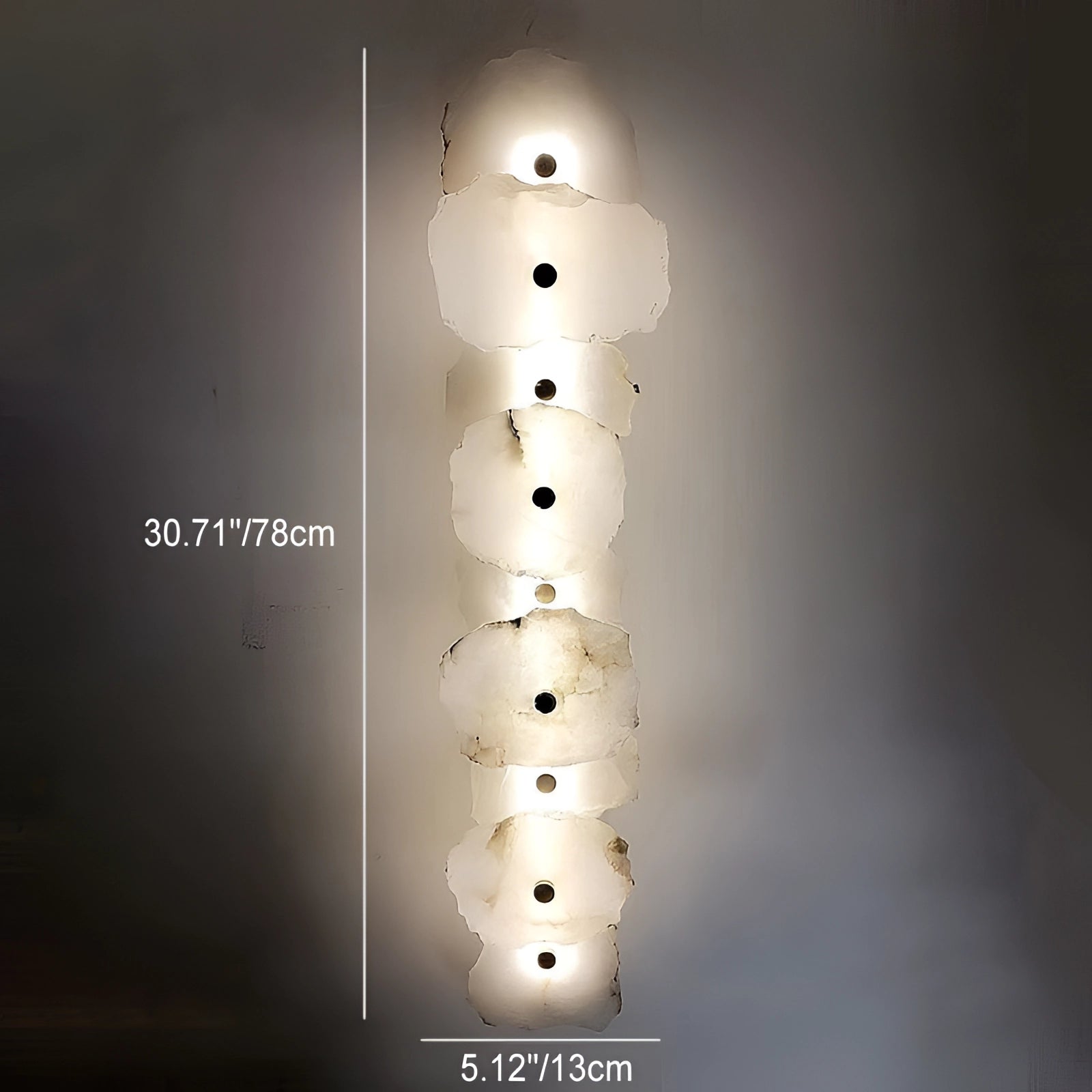 Modern minimalist LED wall lamp with a circular design featuring a sleek metal frame, casting ambient light in a dark setting. The artistic fixture showcases a unique pattern, ideal for enhancing contemporary interiors.