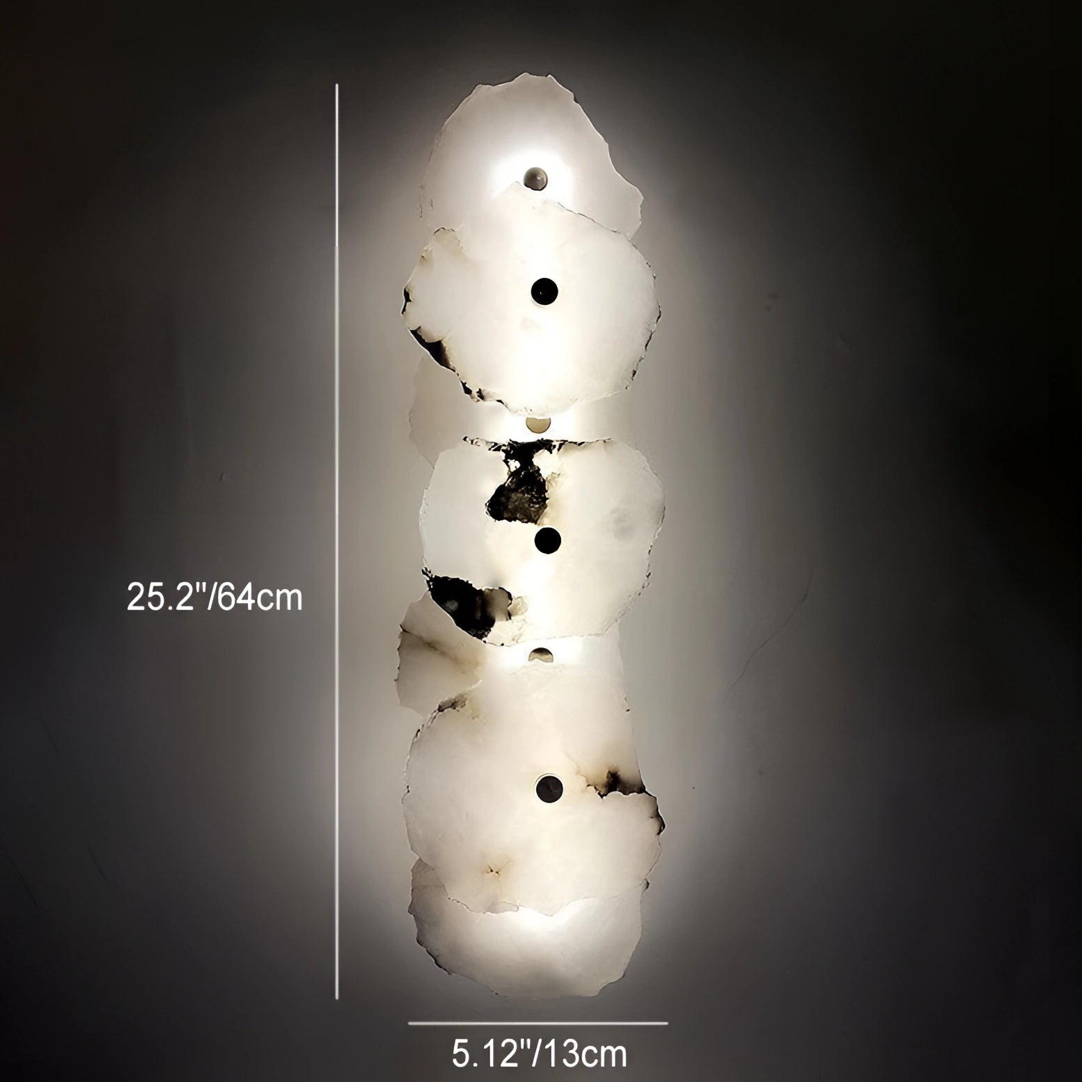 Modern minimalist LED wall lamp with a circular design, providing ambient lighting against a dark background, creating a unique visual art piece.