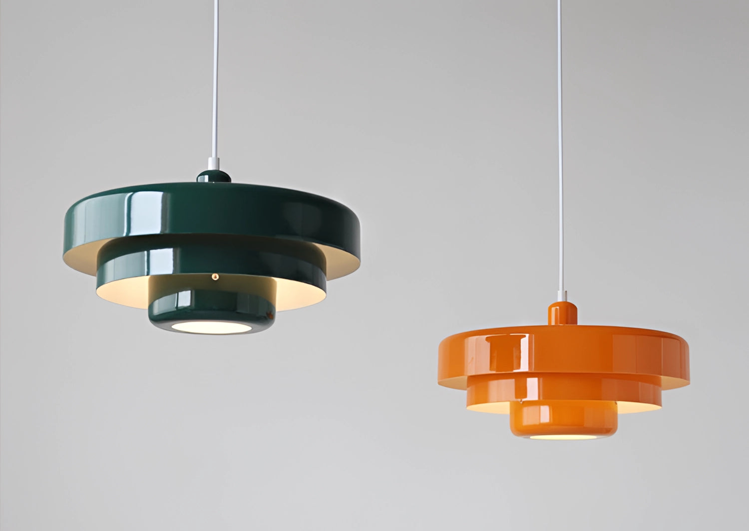 Modern orange pendant light with amber glass shade, wooden accent, and sleek contemporary design, illuminating a space.