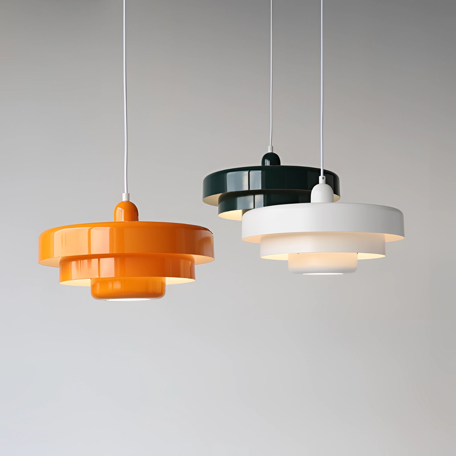 Modern orange pendant light with a sleek, Scandinavian and mid-century contemporary design, featuring a wood accent and rectangular shape, hanging from a ceiling fixture.
