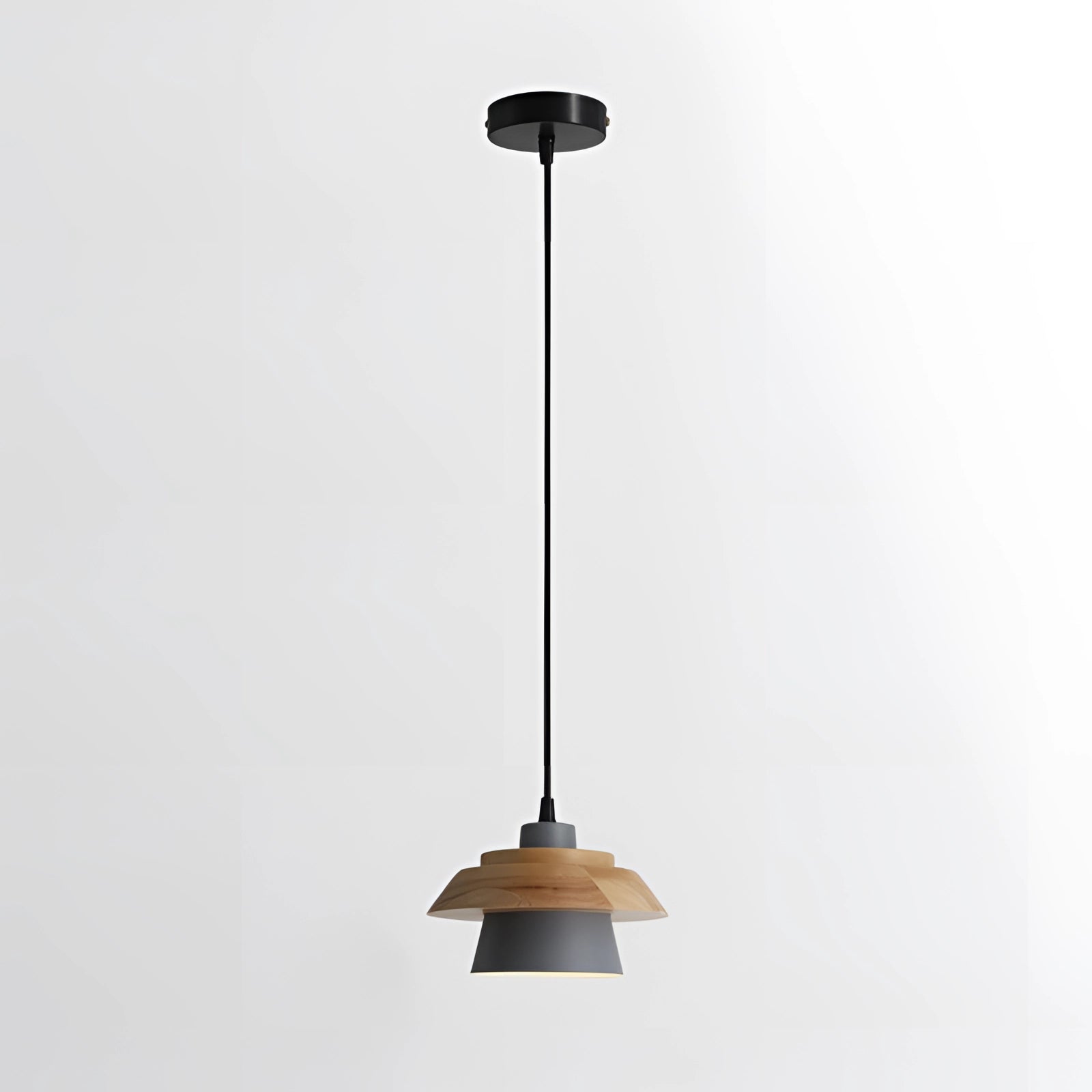 Modern Scandinavian pendant lamp with black and gray finishes, featuring a wood accent. The lamp is designed for kitchen settings, showcasing a stylish and minimalist light fixture that hangs from the ceiling.