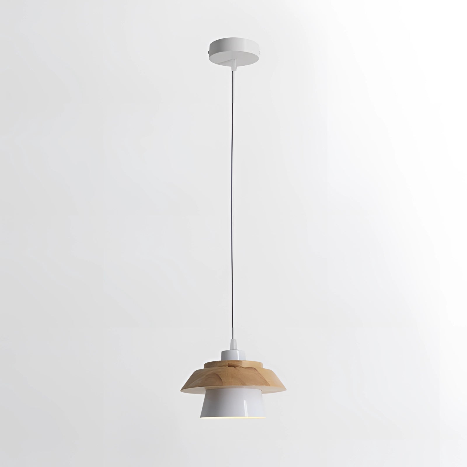 Modern Scandinavian black pendant lamp with a wood accent, designed for kitchens, featuring a sleek white exterior and a combination of metal and wood materials. The lamp hangs from the ceiling, providing a stylish and contemporary lighting solution.