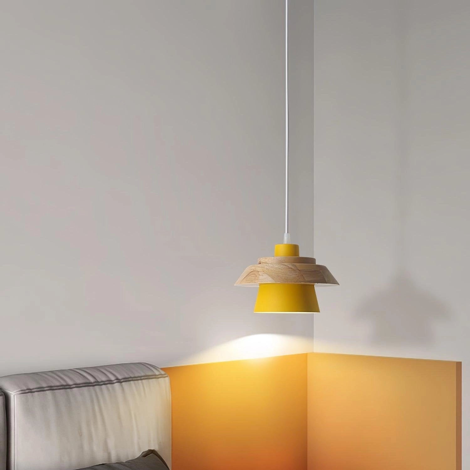 A modern Scandinavian black pendant lamp with a sleek, rectangular shape and wood accents, designed to hang from the ceiling as a stylish light fixture for kitchens.