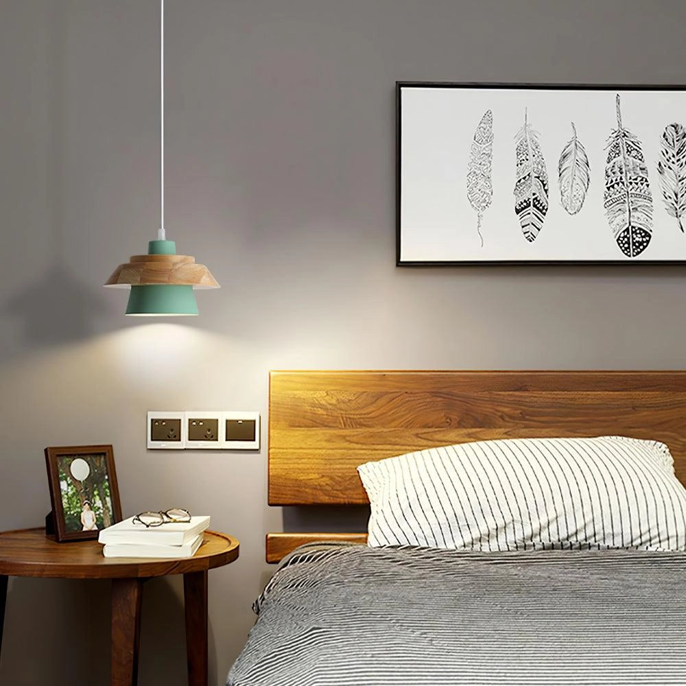 Modern Scandinavian black pendant lamp with wood accent, featuring a sleek design suitable for kitchens, highlighting its elegant combination of black and wood materials.