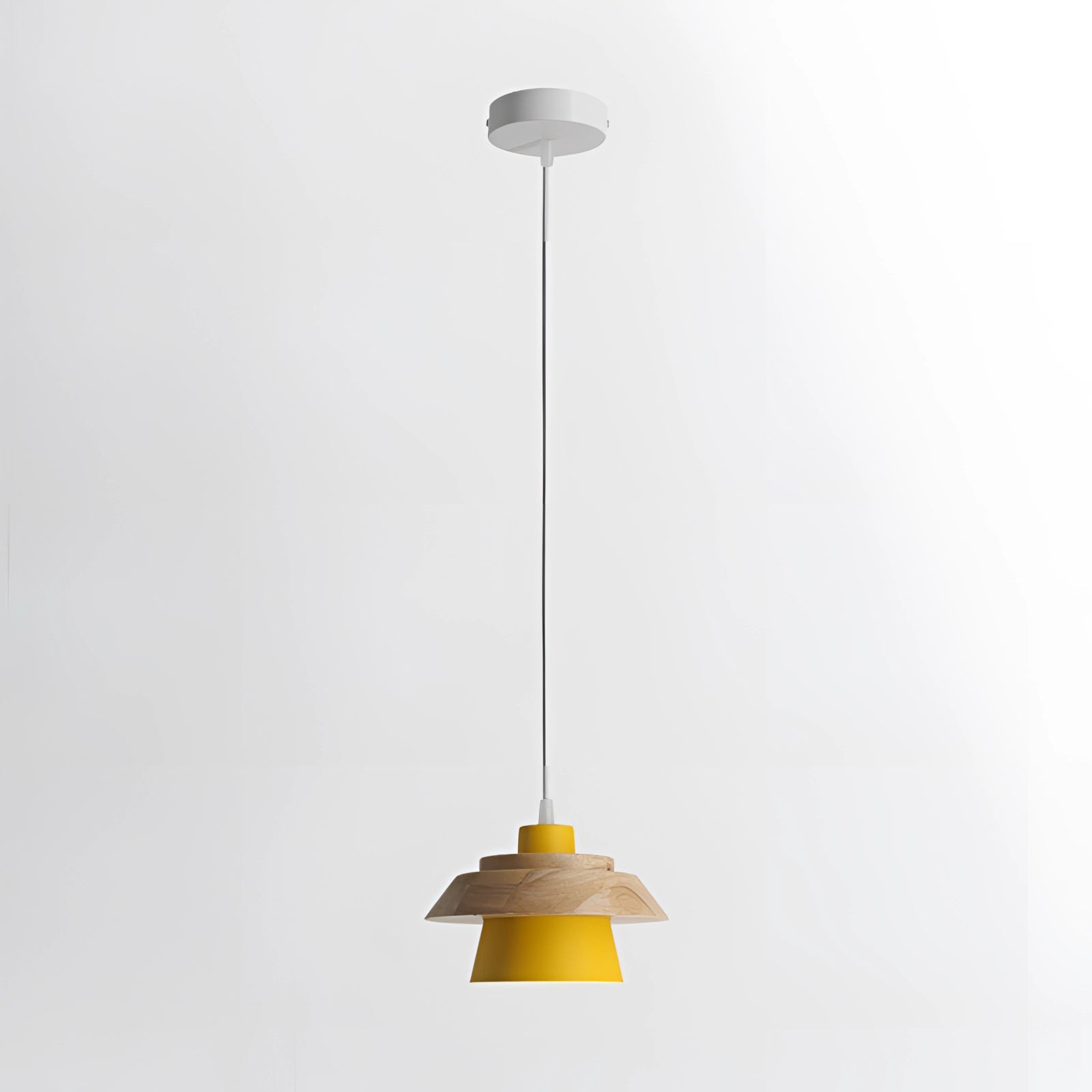 Modern Scandinavian pendant lamp with a sleek black finish and wooden accent, featuring a yellow interior and suspended from the ceiling, ideal for kitchen lighting.