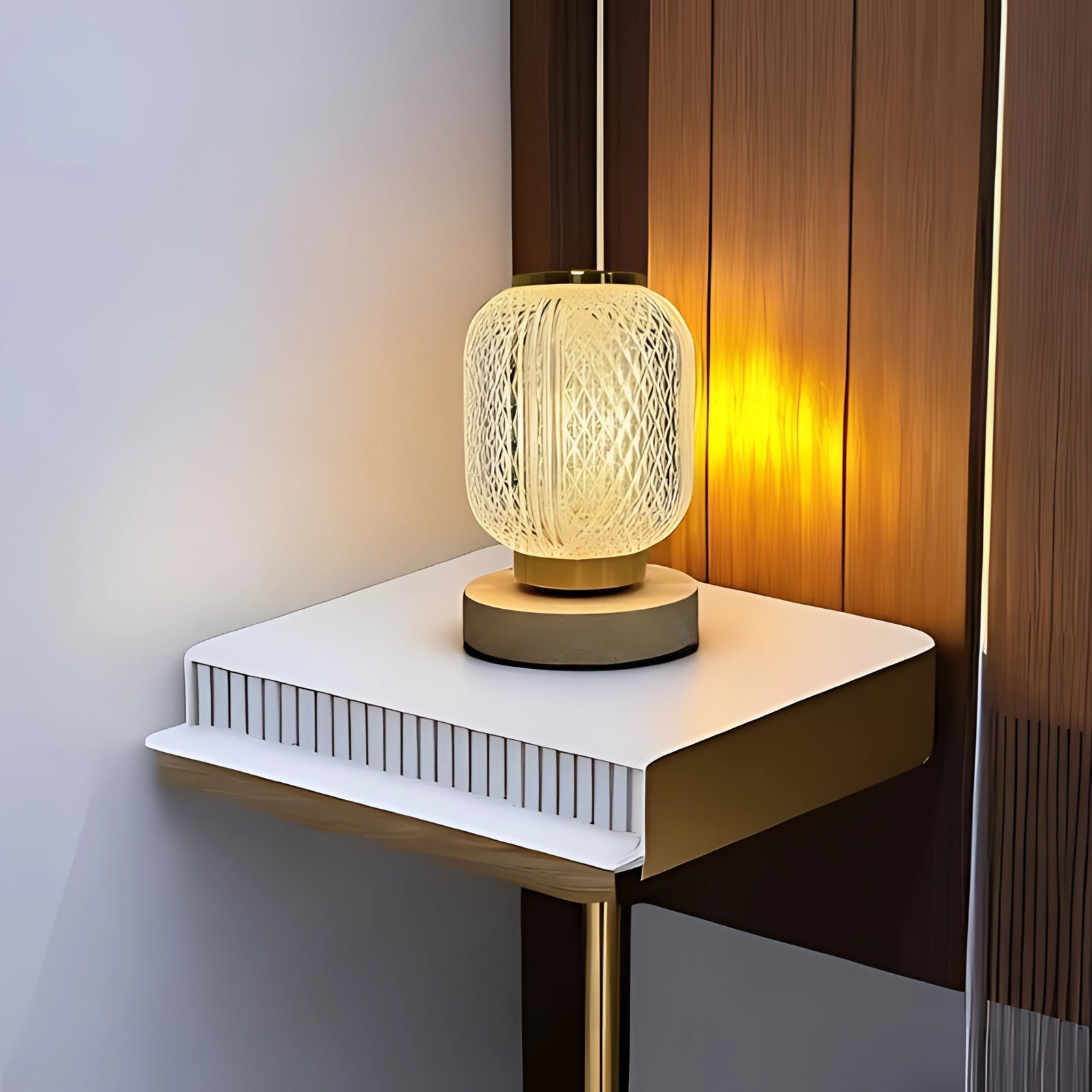 Modern woven bedside lamp placed on a wooden table in a bedroom setting, showcasing its elegant ambient lighting design with hardwood elements.