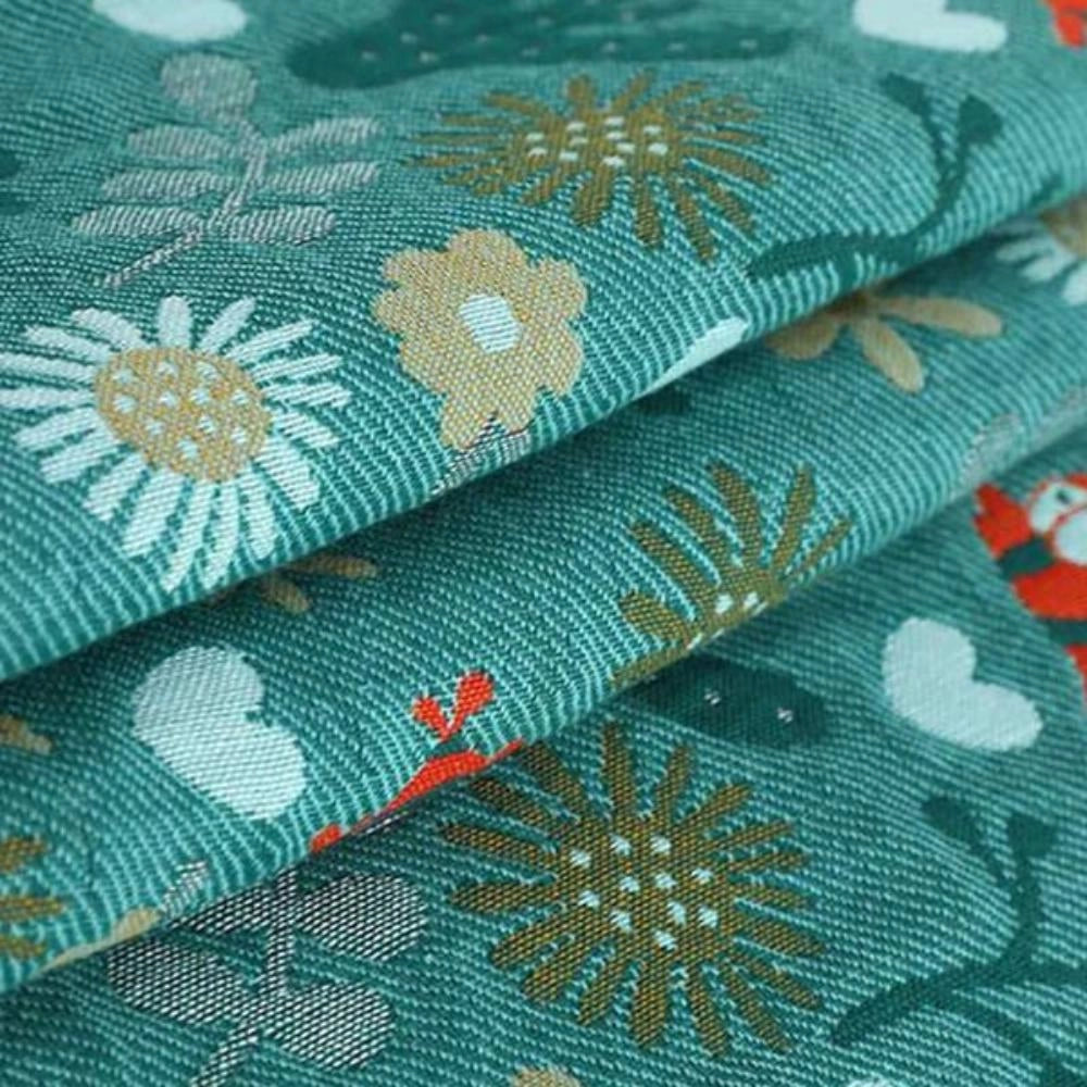 Ocean-themed throw pillows featuring a vibrant pattern of fish and coral, with a mix of green, azure, and aqua shades. The rectangular pillows are made from high-quality textile materials, adding a nautical touch to home decor with their creative and artistic design.