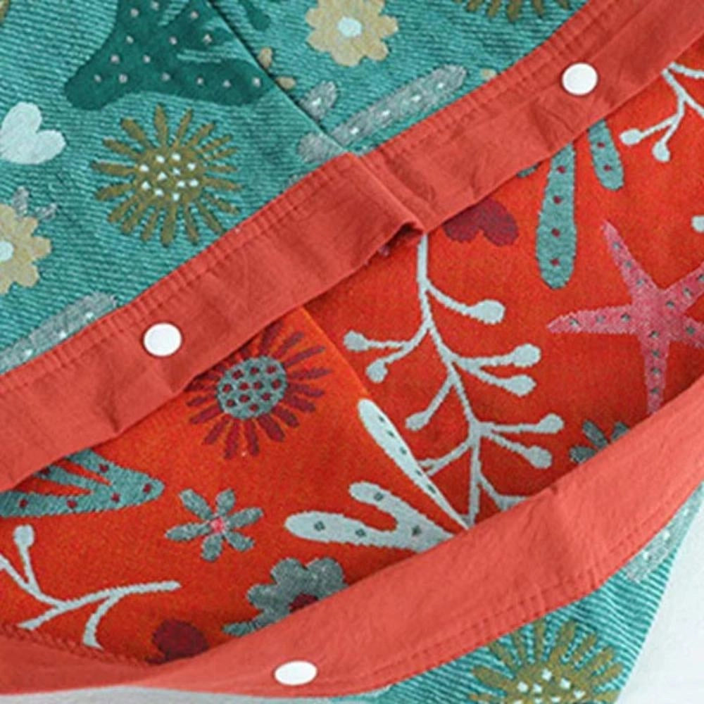 Ocean-themed throw pillows featuring vibrant patterns of fish and coral in shades of azure, pink, aqua, and magenta, ideal for nautical home decor.